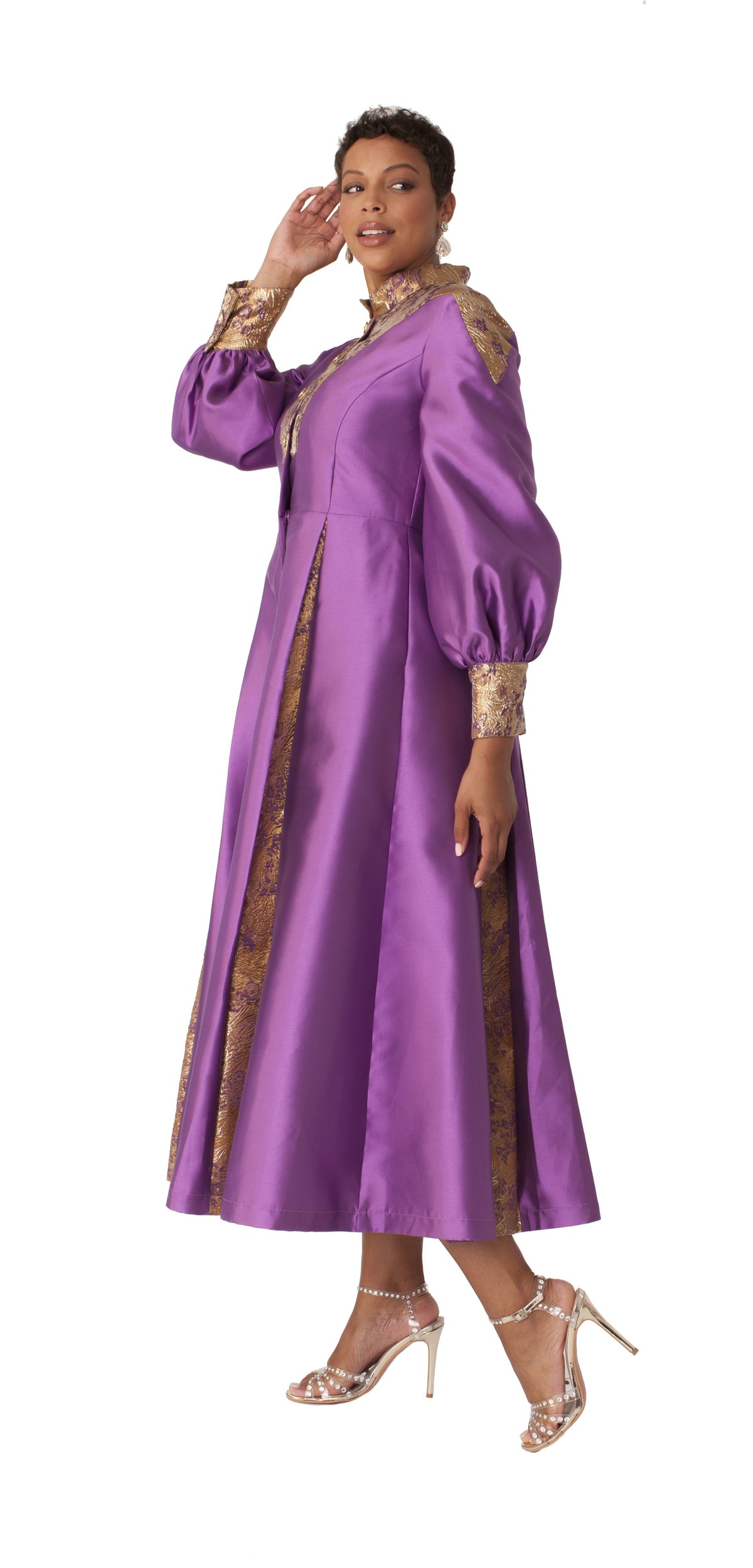 Plus size purple and gold bishop sleeve clergy robe shown in motion, flowing silhouette designed for church and formal occasions by Tally Taylor