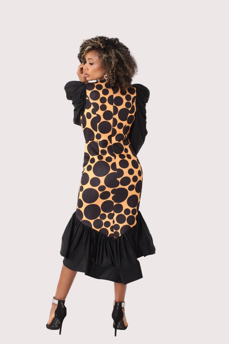 Black and mustard polka dot high-low dress with puff sleeves shown from the back, showcasing the full ruffled hem and structured fit, elegant occasion dress by For Her NYC
