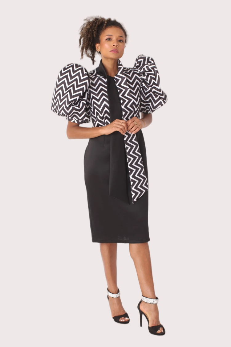 Black and white puff sleeve zigzag print dress styled with pencil skirt silhouette, front walking pose.