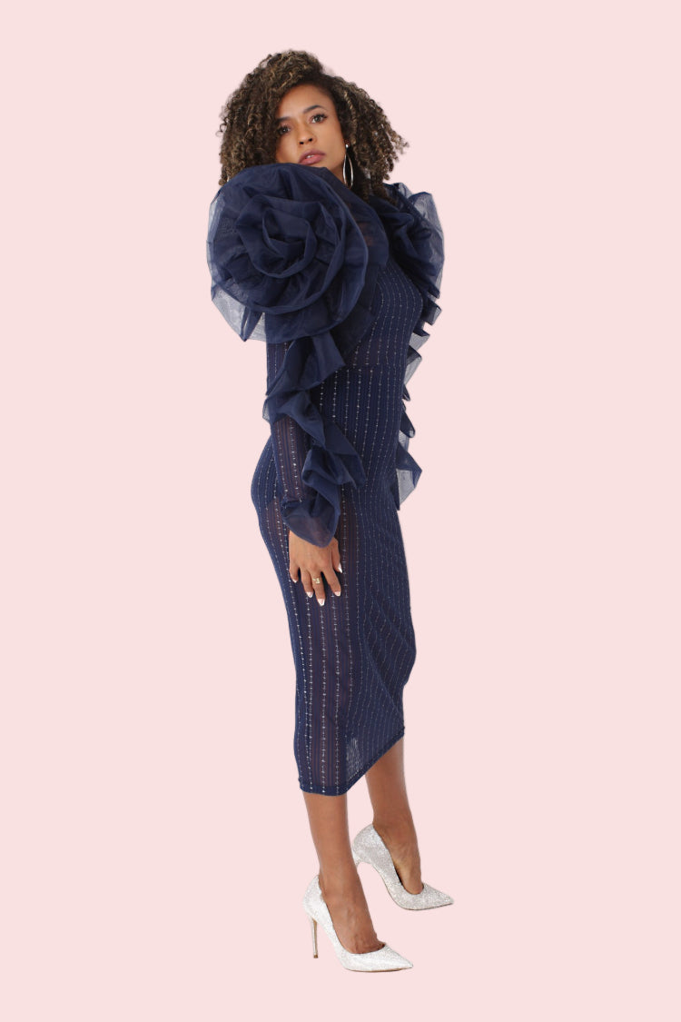 Navy sheer ruffled midi dress shown in side angled pose to show ruffle detail and silhouette. For Her NYC