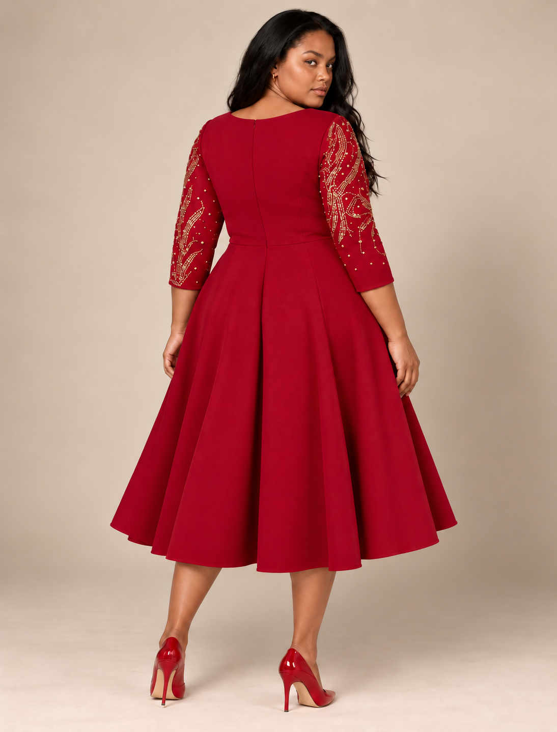 Back view of a plus-size model wearing the Tally Taylor Elegant Sequin A-Line Dress – U0261 in red with gold sequin detailing on the three-quarter sleeves