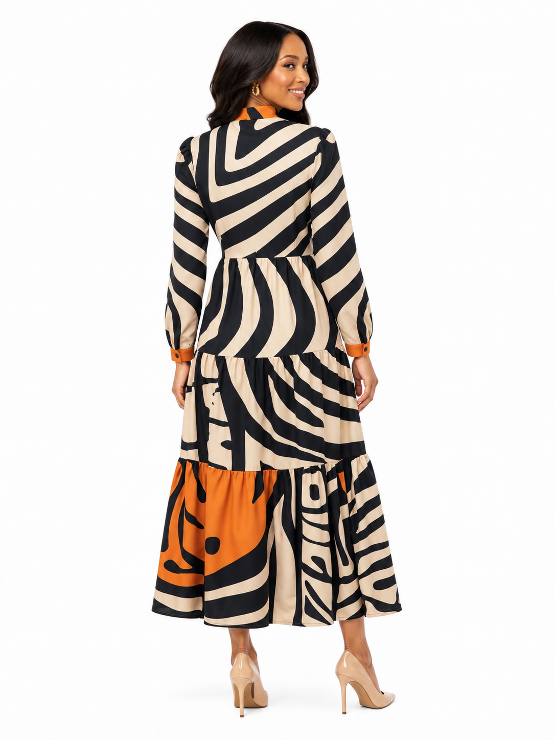 Back view of model wearing the Tally Taylor Wavy Graphic Print Tiered Maxi Dress in black, multi colors, featuring a bold abstract print and tiered skirt, style S0267