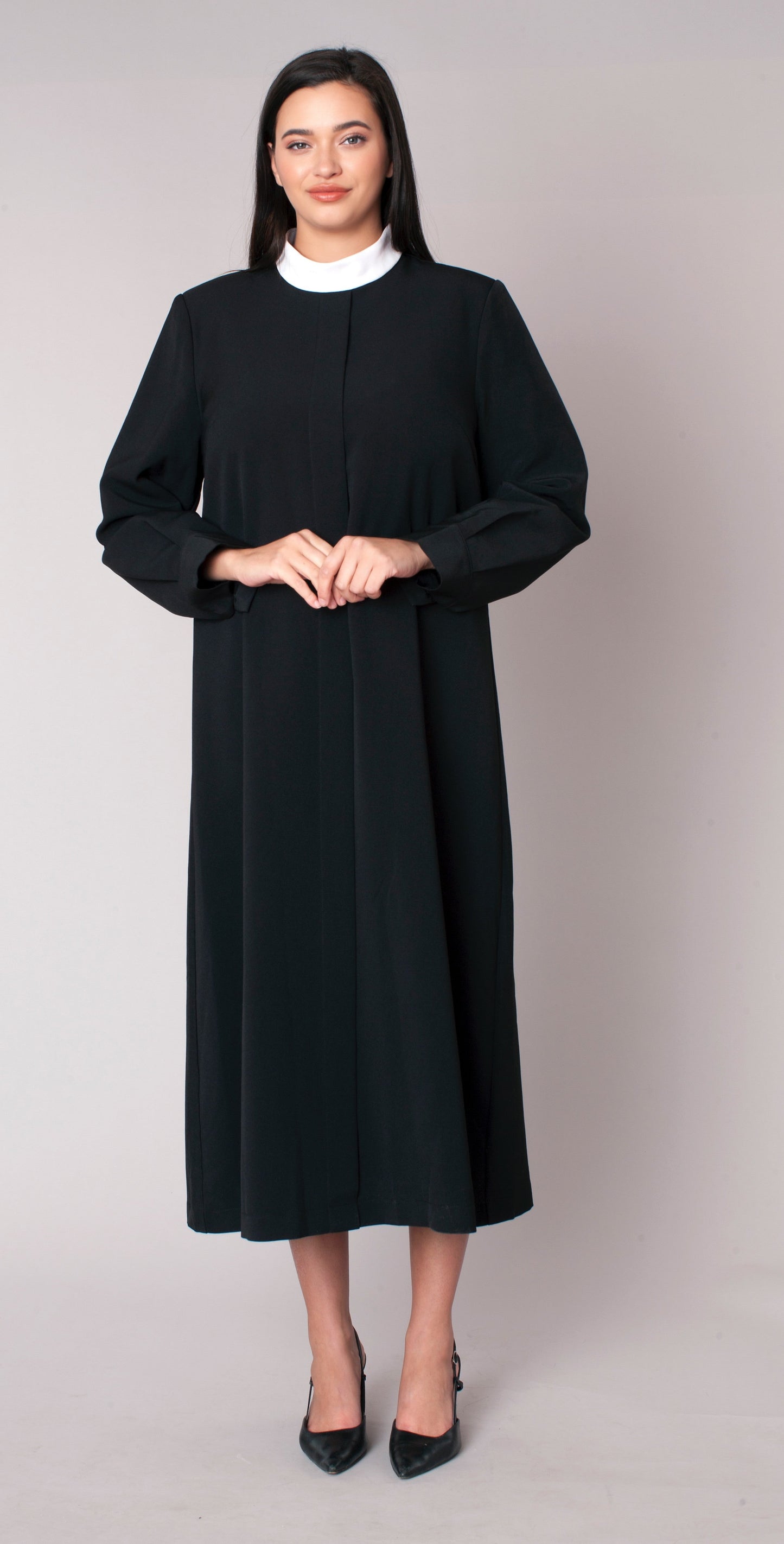 Front view of plus size black two-piece brocade clergy robe with cross panels and long sleeves Tally Taylor