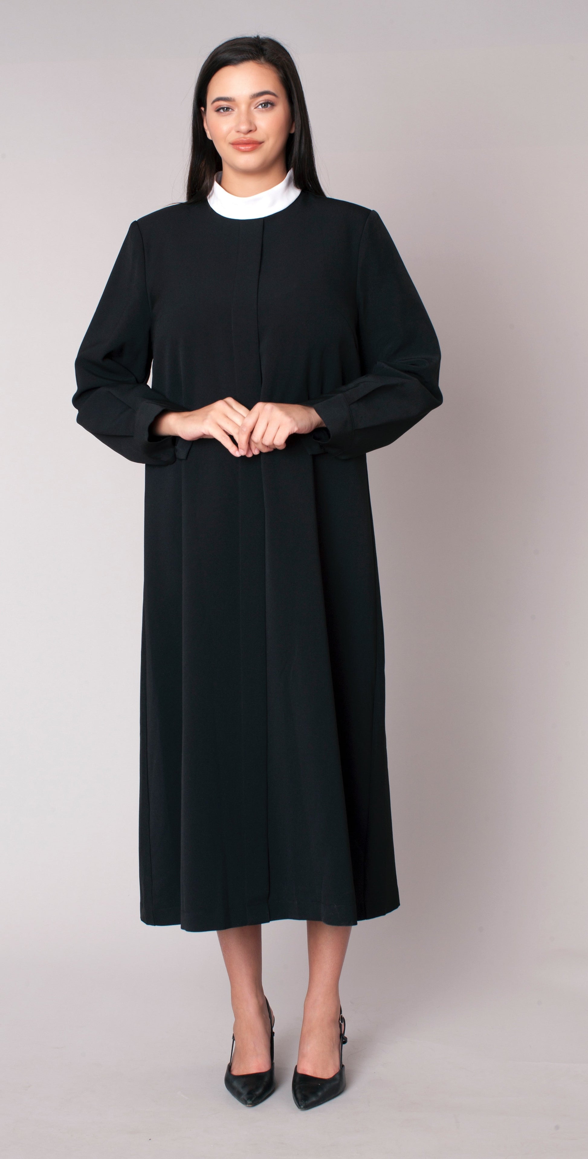 Front view of plus size black two-piece brocade clergy robe with cross panels and long sleeves Tally Taylor