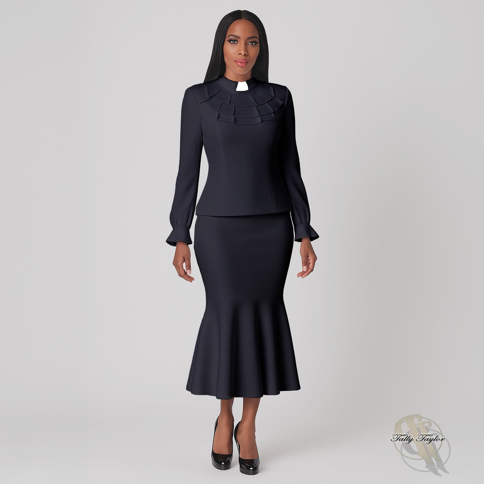 Black two-piece ruffle church set with clerical collar worn by model standing full-length front view – Tally Taylor