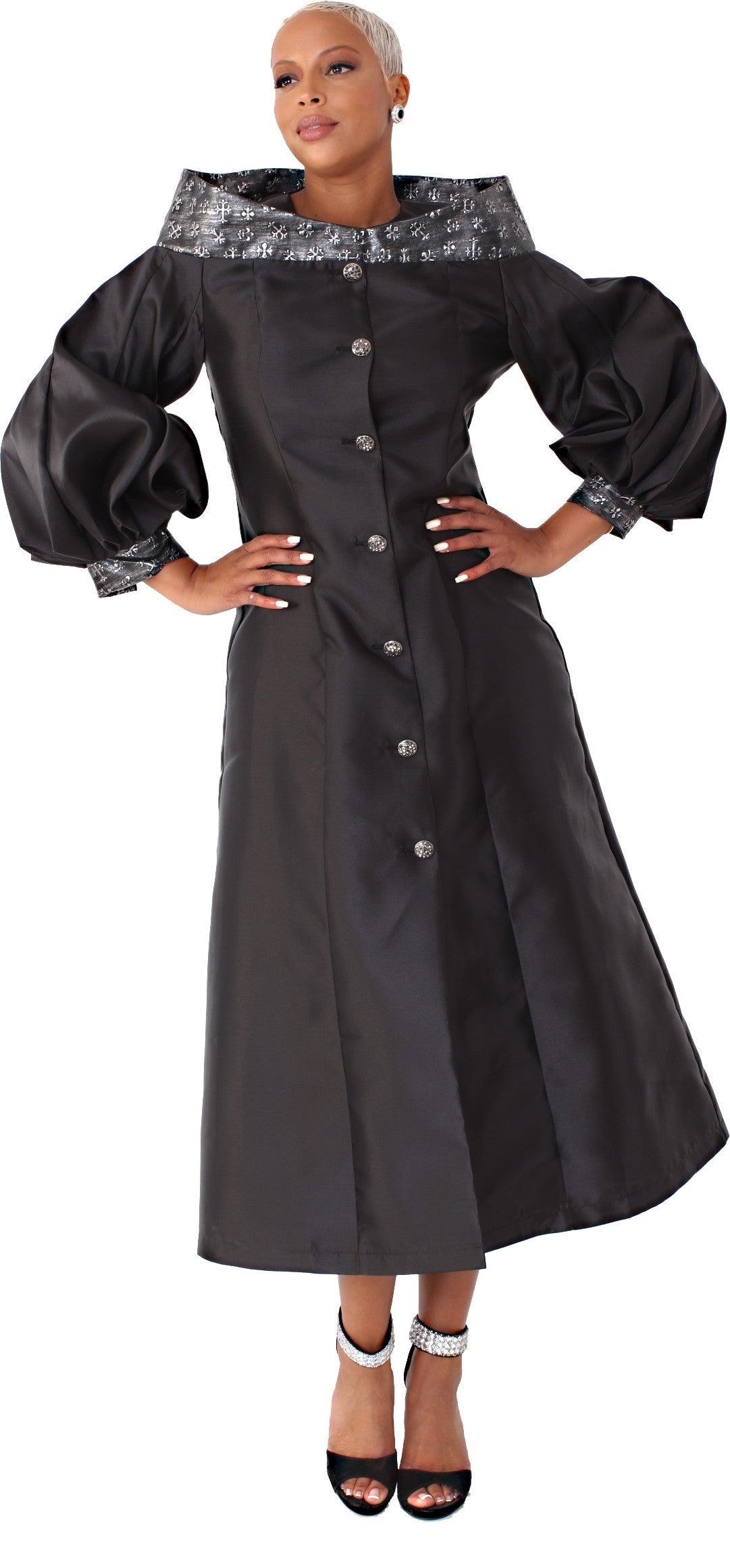 Women’s cassock robe for church, clergy, or choir in black with jeweled buttons and bishop sleeves, model front view showing full clergy robe silhouette – Tally Taylor