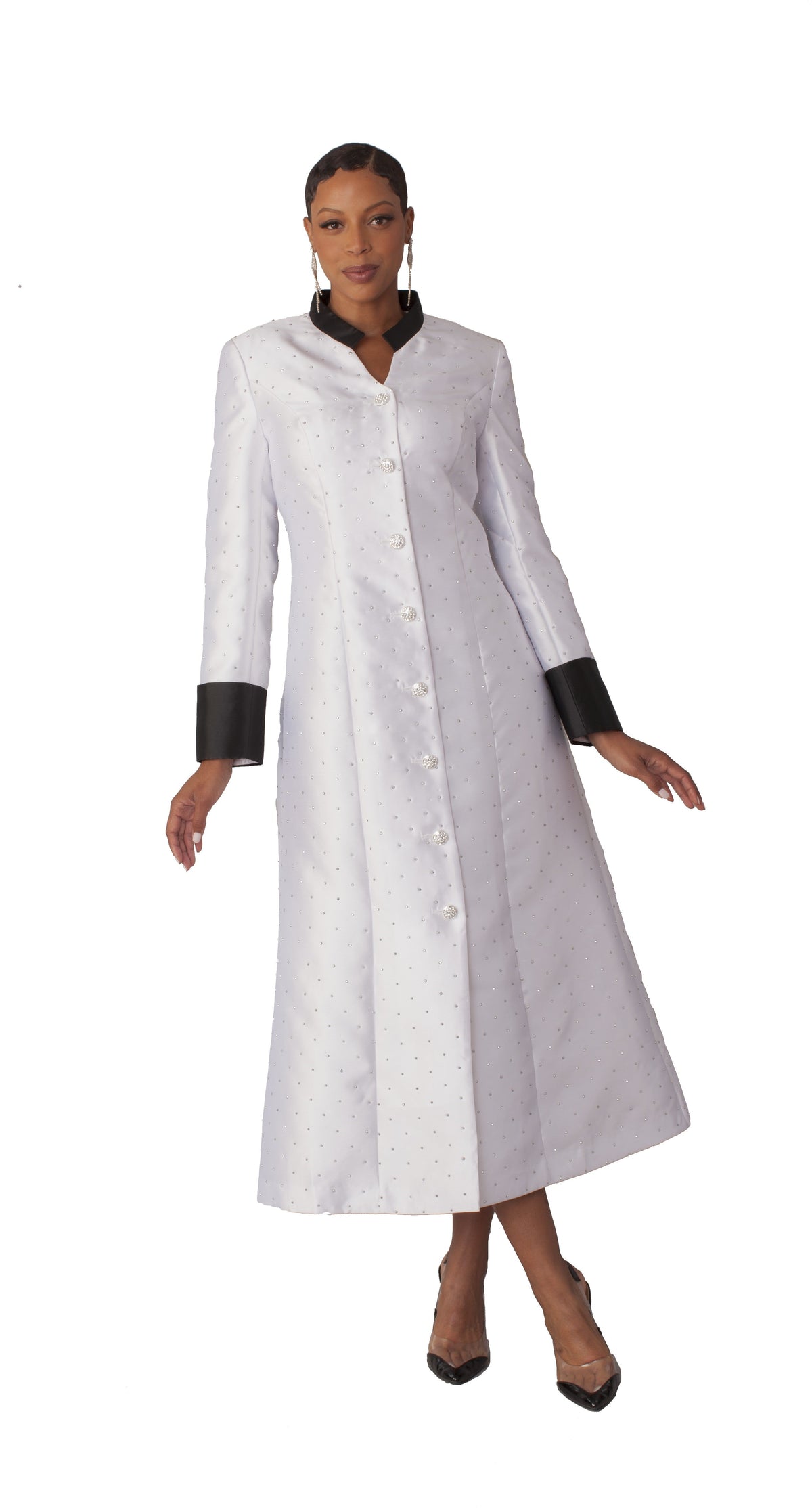 Women’s preaching robe for church or clergy in white with rhinestone buttons and studded detailing, model front view showing elegant full-length robe silhouette – Tally Taylor