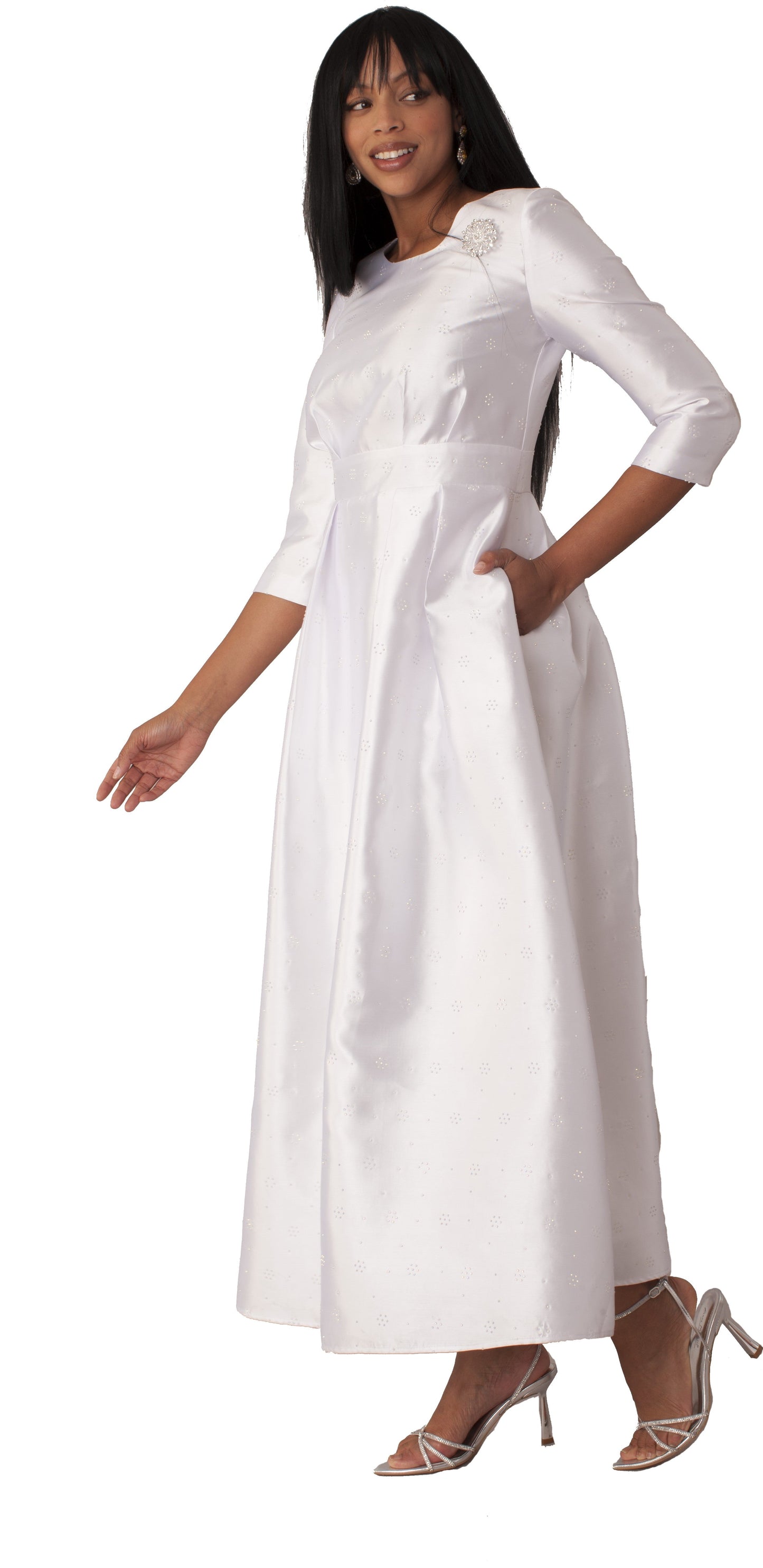 Plus size white silver rhinestone embellished church dress with 3/4 sleeves shown in angled front pose by Tally Taylor