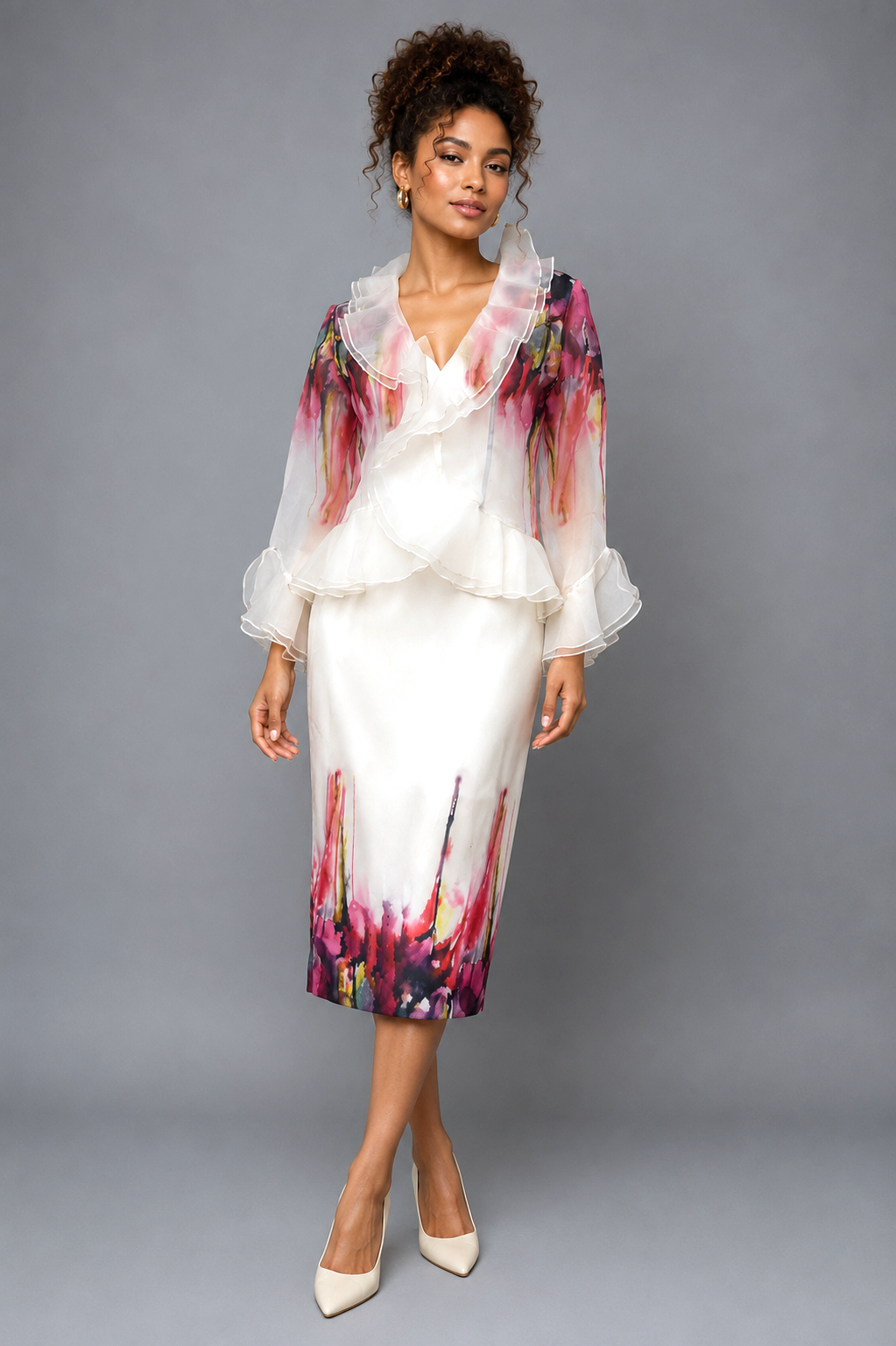 Woman wearing the Elegant Organza 3-Piece Church Dress Set in White Multi featuring a sheer ruffle organza jacket over a colorful printed dress by Tally Taylor.