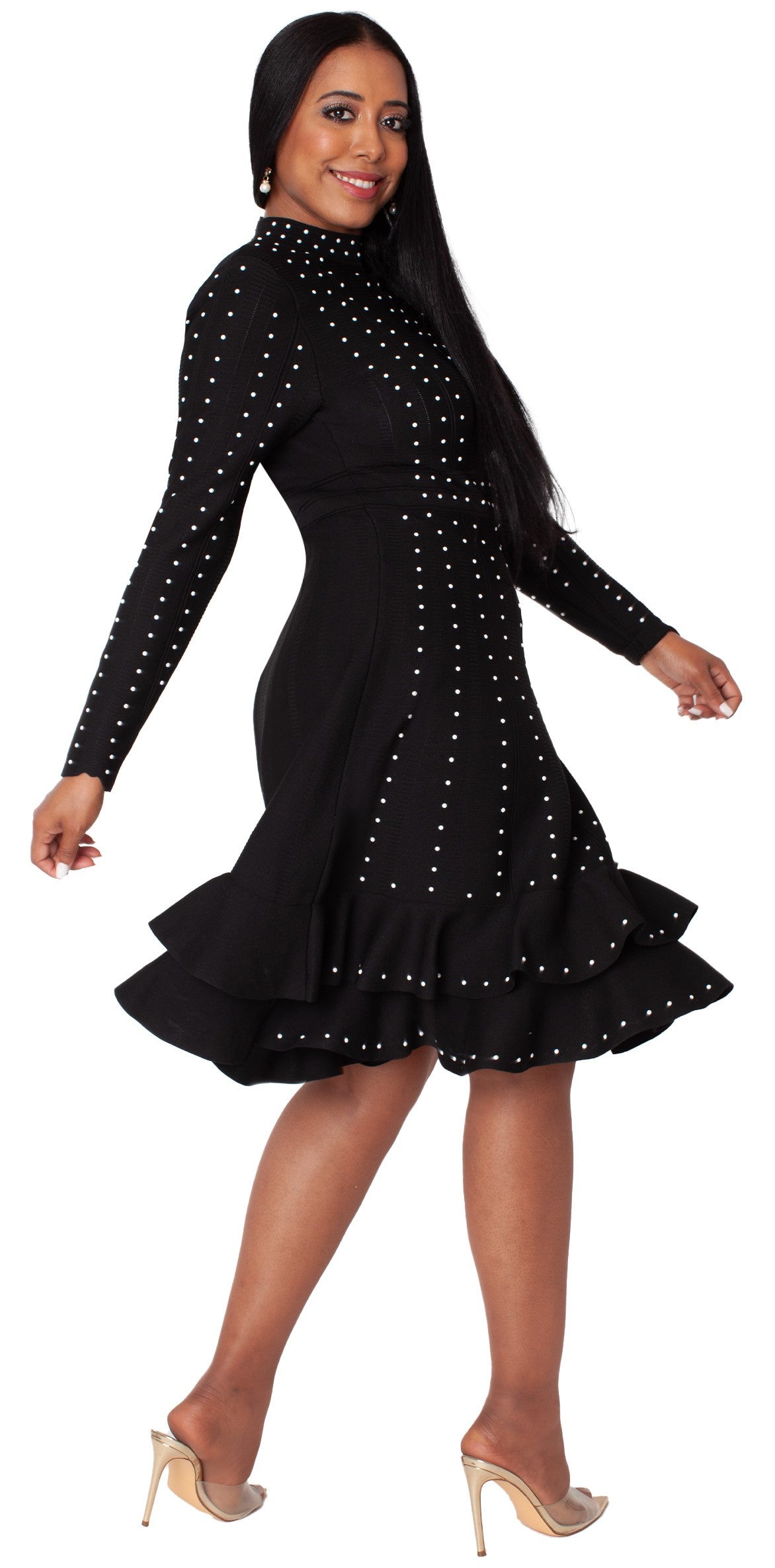 Black knit studded dress with ruffle hem movement pose by Tally Taylor
