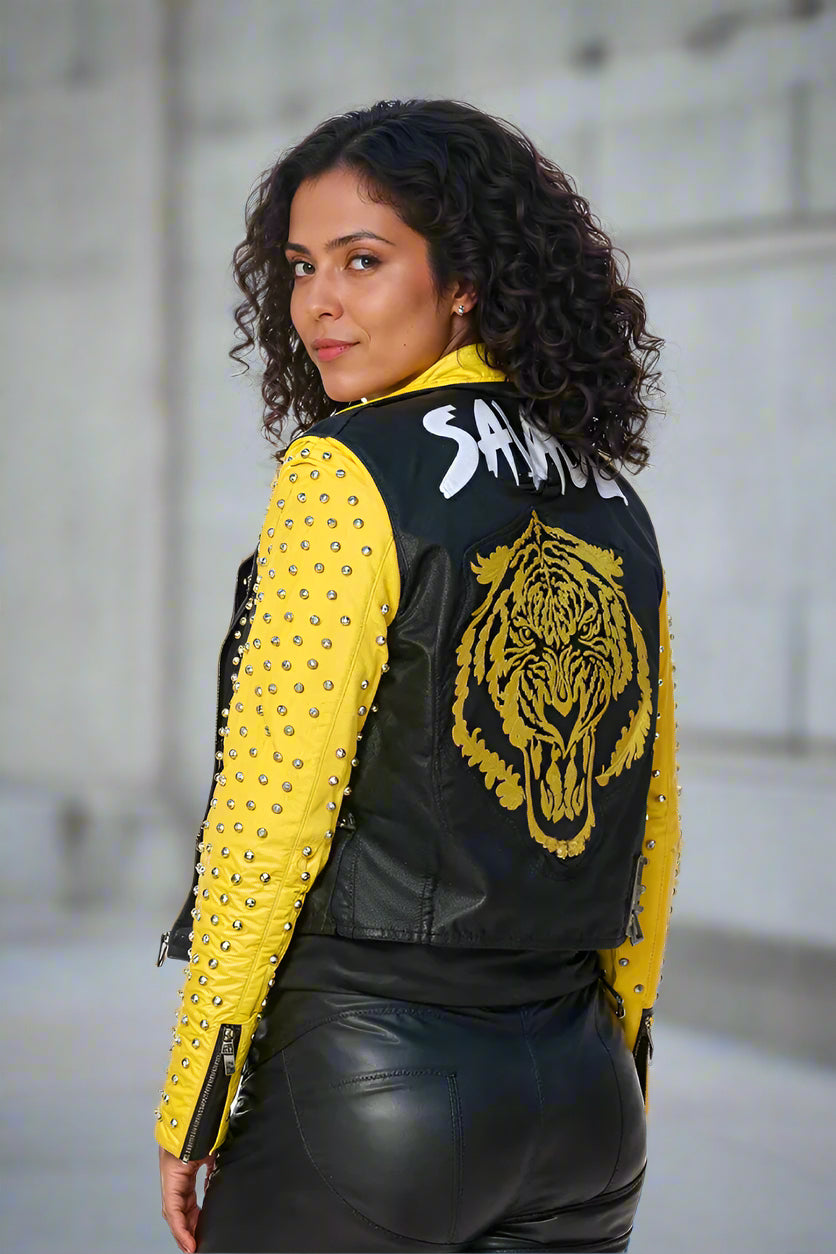 Yellow and black studded faux leather moto jacket showing back view with embroidered tiger graphic, For Her NYC