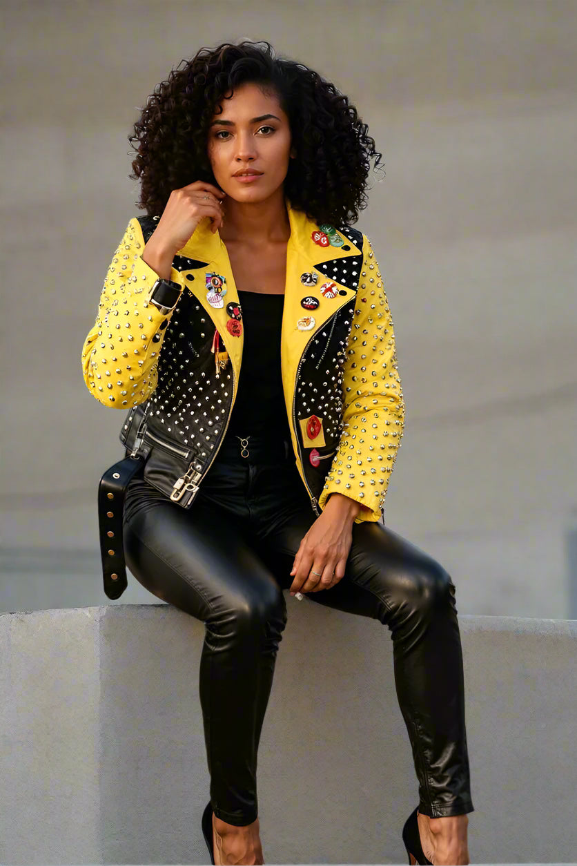 Yellow and black studded faux leather moto jacket styled open with bold contrast sleeves, alternate front pose, For Her NYC