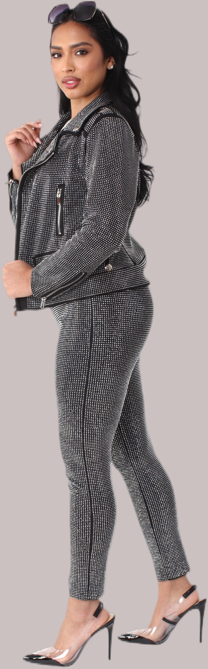 Black faux suede moto jacket with allover diamond embellishments style 82022 shown front-facing in a standing pose for an edgy glam look by For Her NYC