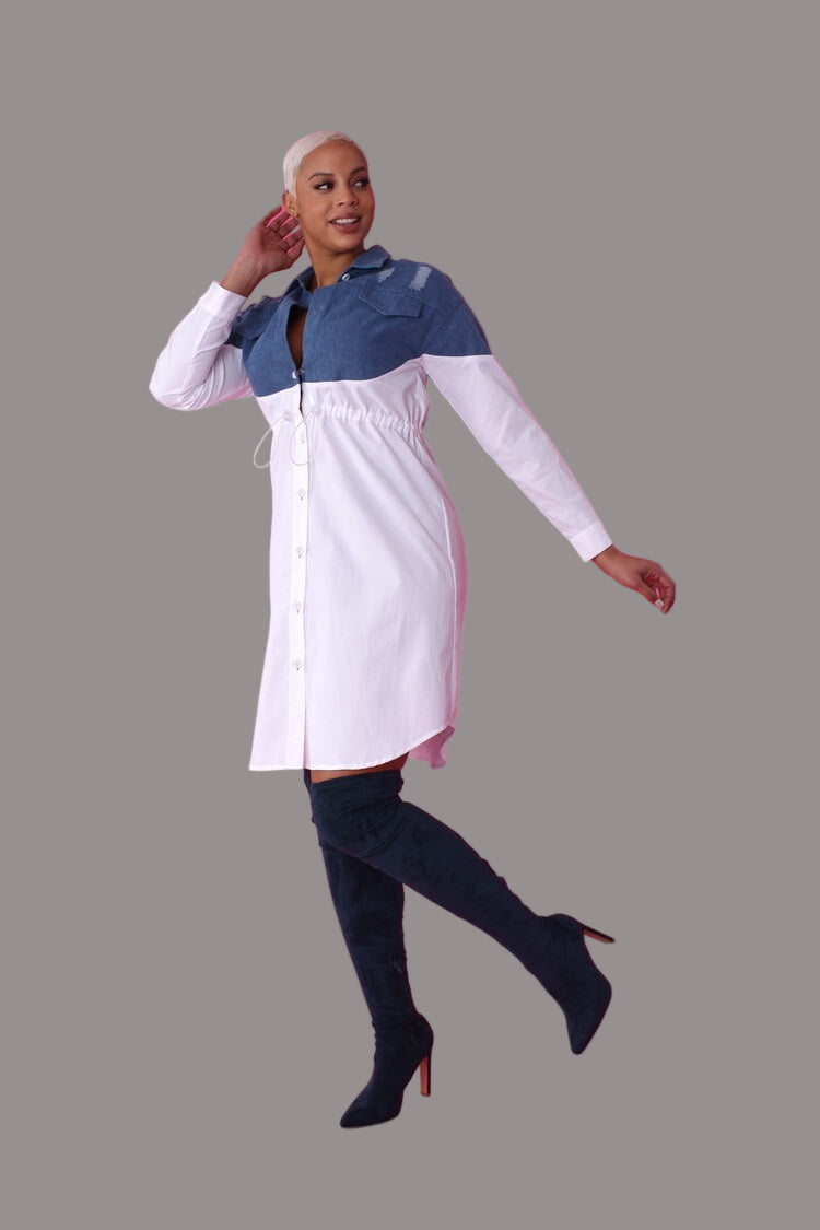 Alt text: Model walking forward in the Denim Combo Woven Shirt Dress, highlighting the relaxed fit and drawstring waist – For Her NYC