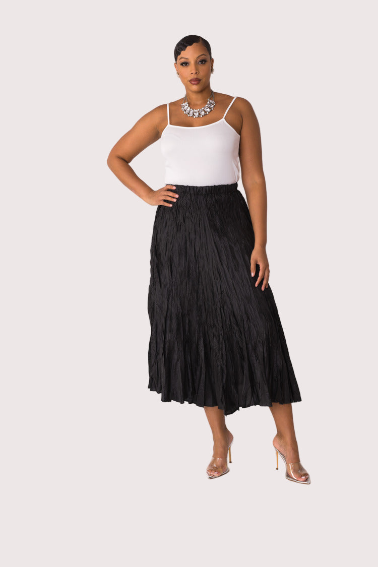 Elastic waist crinkle maxi skirt in black, model standing front view, For Her NYC