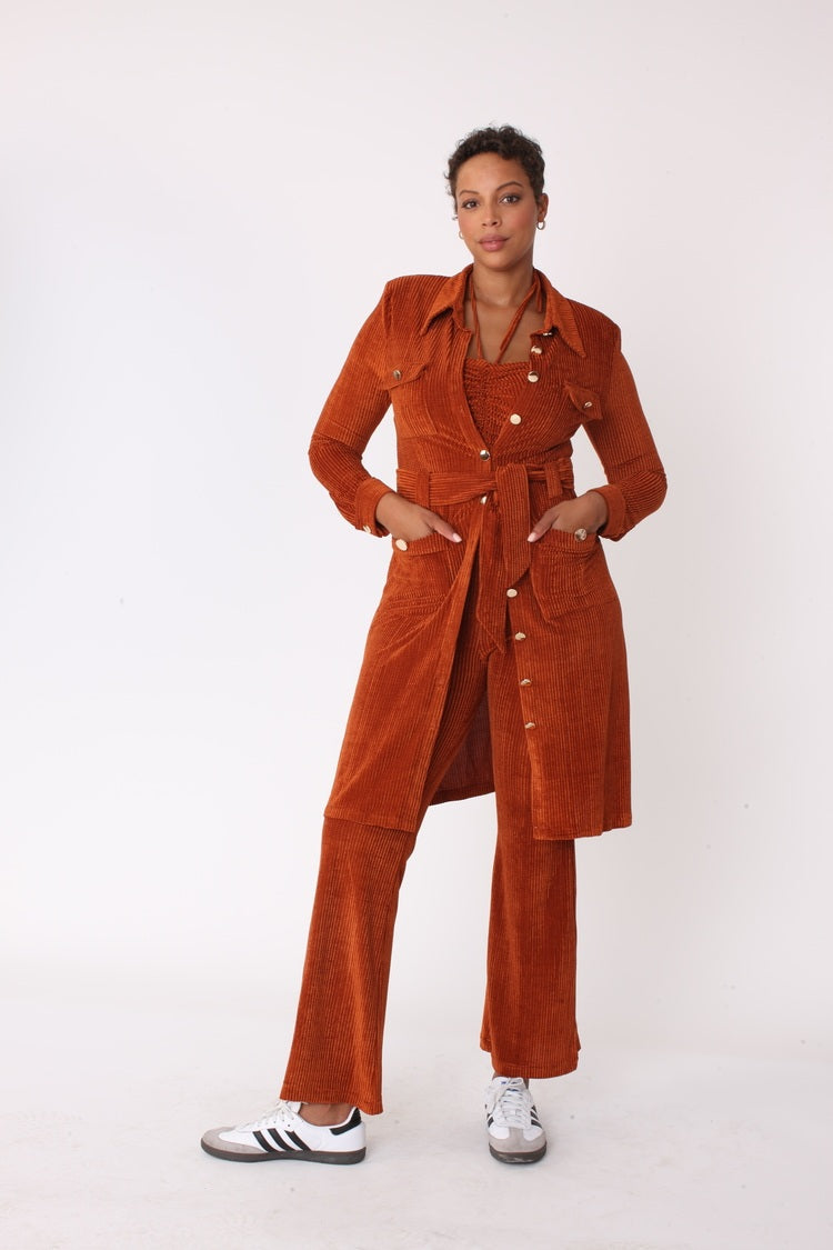 Brown luxe corduroy three piece set shown in front standing pose wearing long coat by For Her NYC