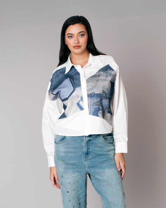 White cropped button-down shirt featuring bold denim star patch detailing on the front, model standing facing forward styled with jeans For Her NYC