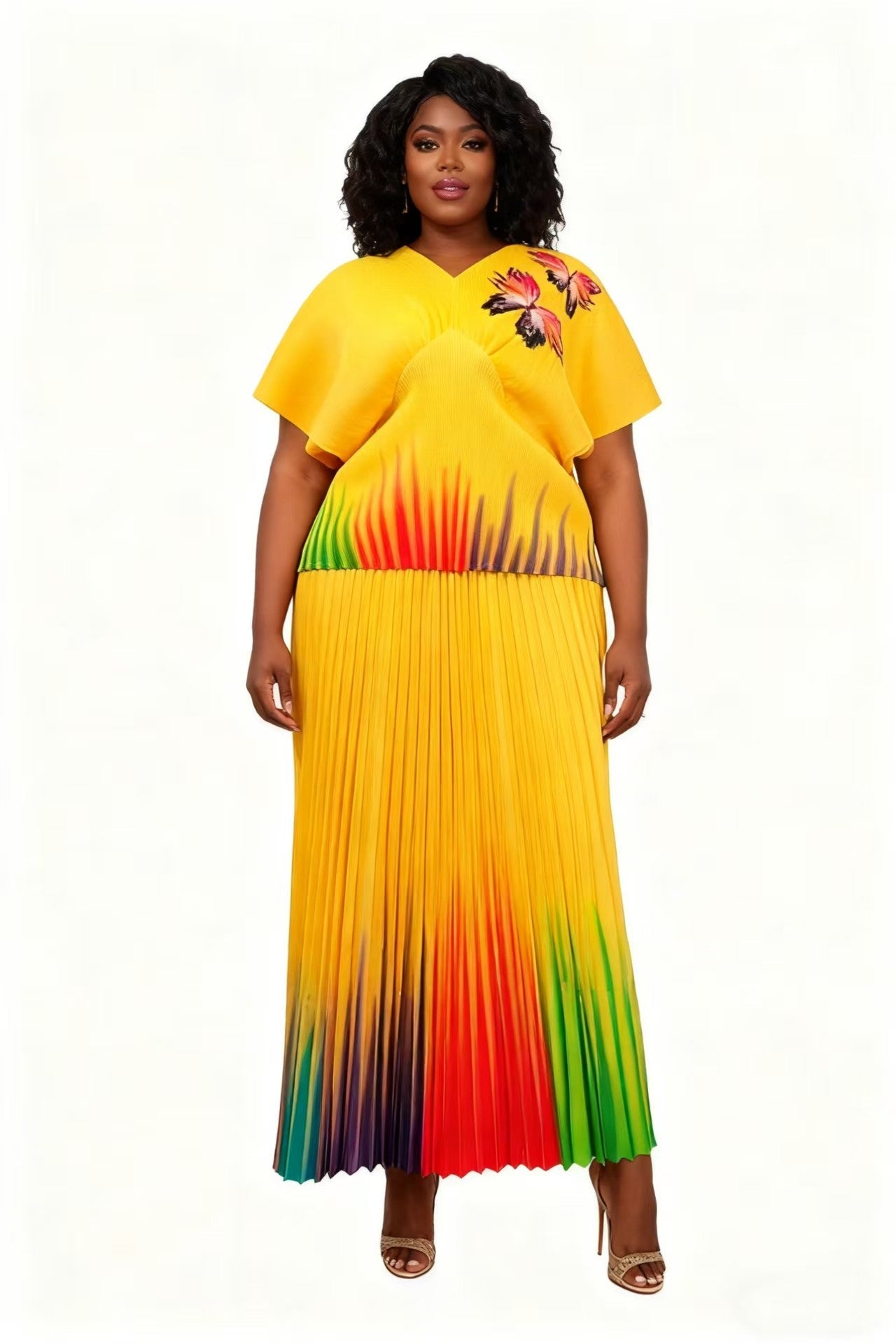 83016-yellow multi Front view of model wearing a gradient pleated skirt set with relaxed top and flowing midi skirt, For Her NYC