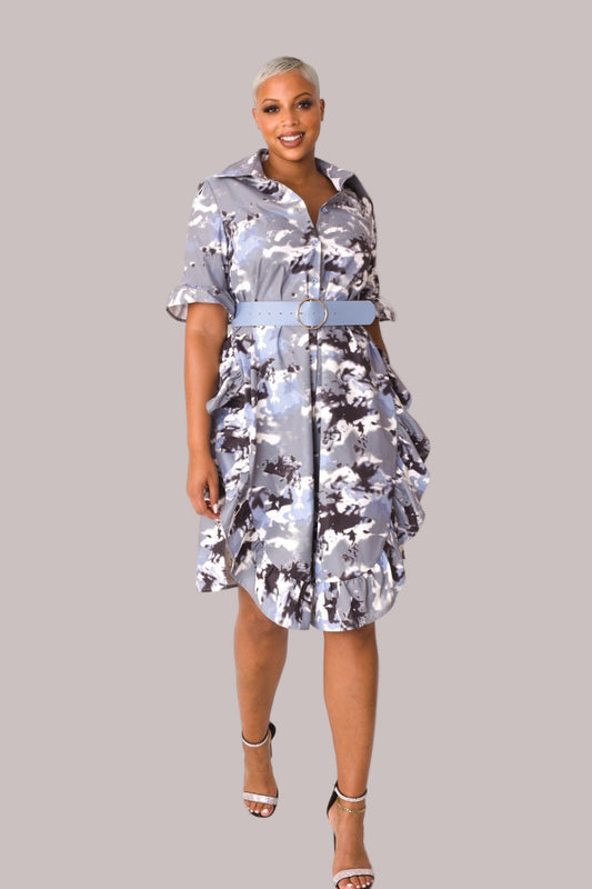 Model wearing camo print ruffle midi dress, front-facing hero pose highlighting ruffle detailing, fitted waist, and allover camouflage print by For Her NYC