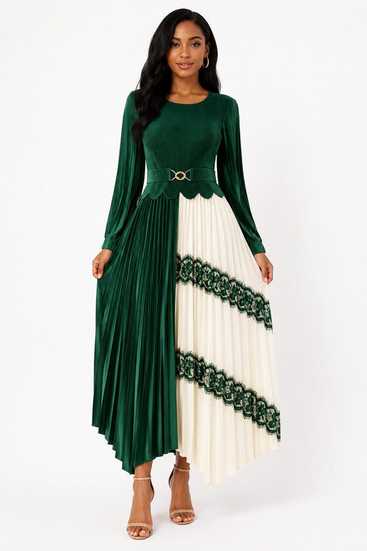 Model wearing the Colorblock Pleated Lace Trim Midi Dress in Green featuring flowing pleats, lace trim accents, a belted waist, and a graceful midi-length silhouette by For Her Nyc