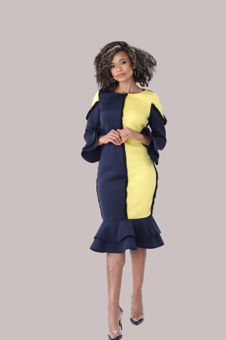 Front view of yellow and navy colorblock ruffle midi dress with hand on hip pose — For Her NYC.