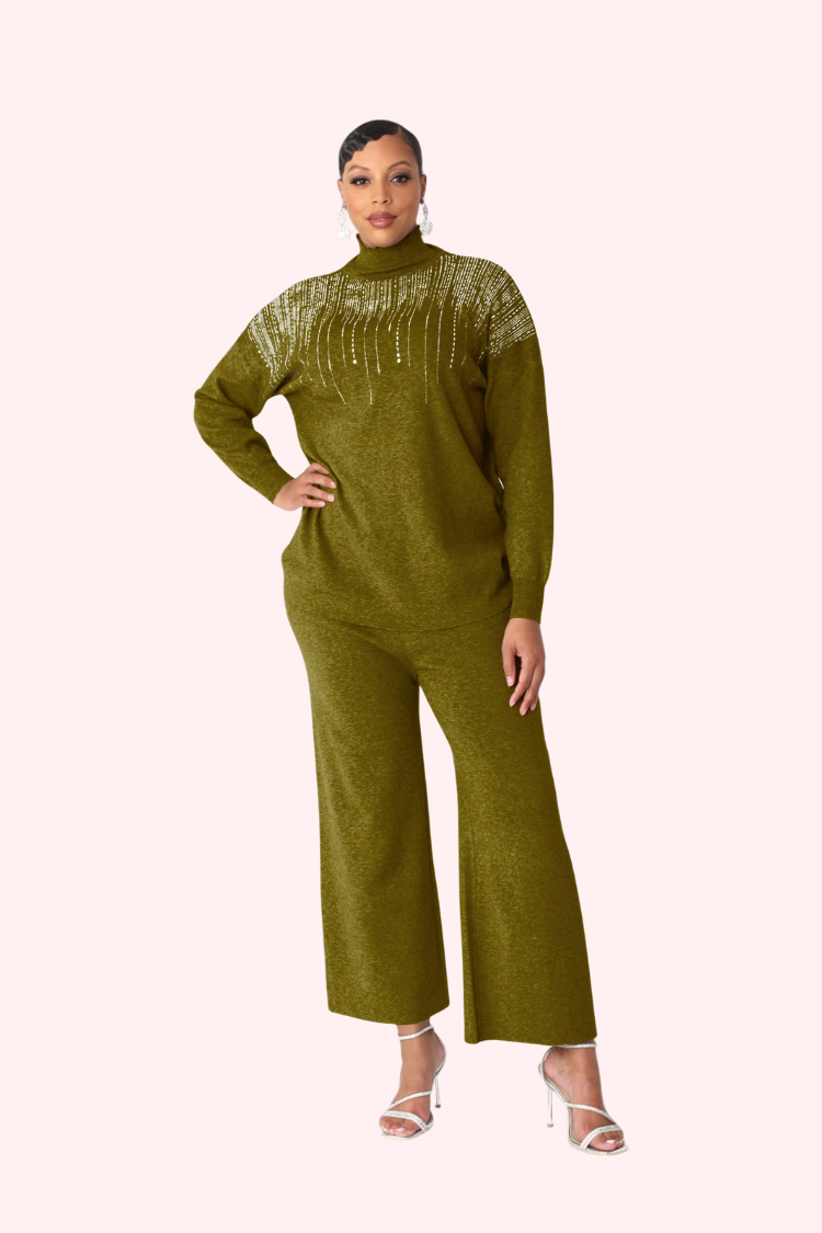 Model wearing olive rain lounge set standing front facing with hands on hips, featuring embellished neckline and wide leg pants by For Her NYC