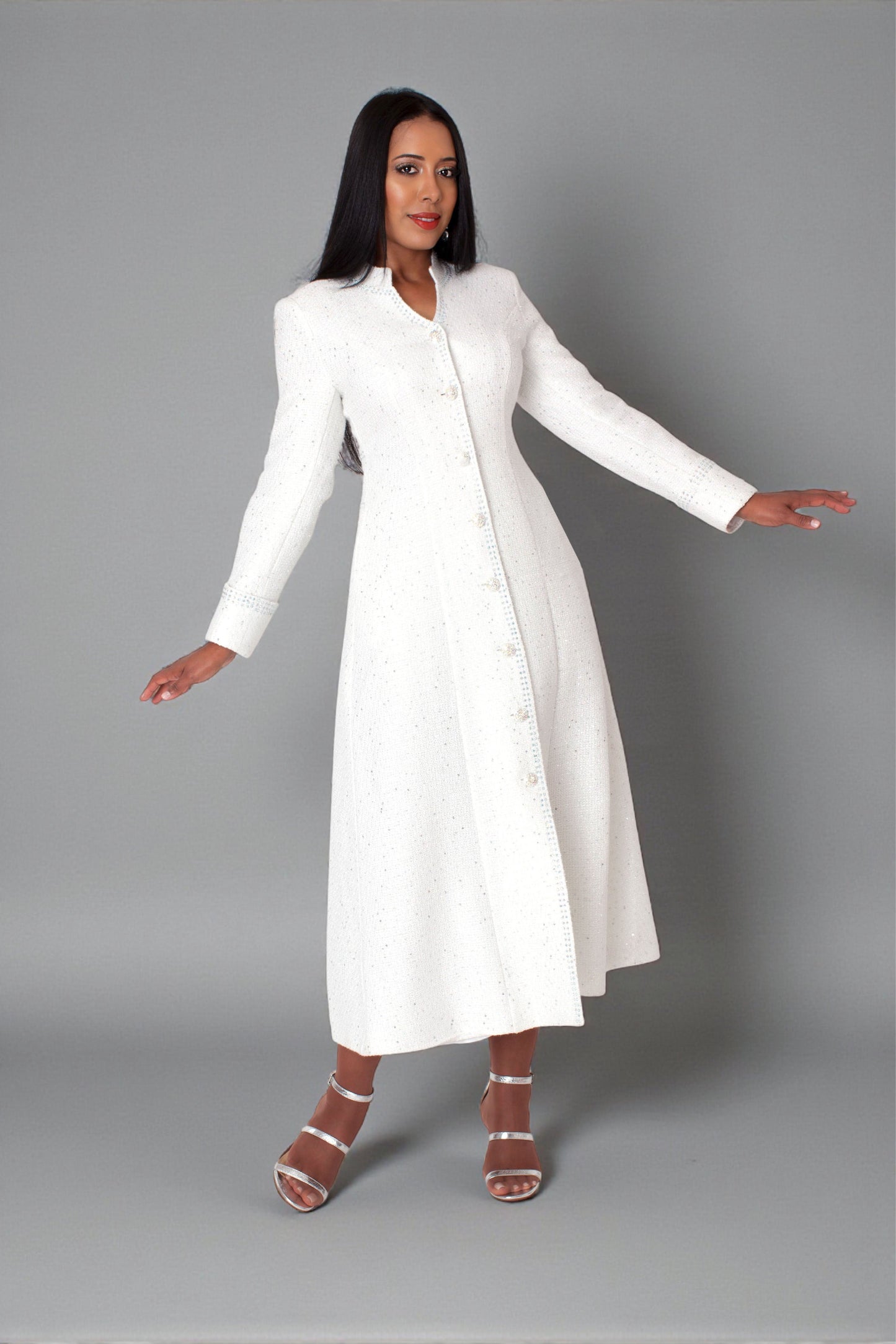Model wearing the white elegant plus size tweed robe standing front facing, highlighting luxe tweed texture, crystal button detailing, and graceful modest design by Tally Taylor