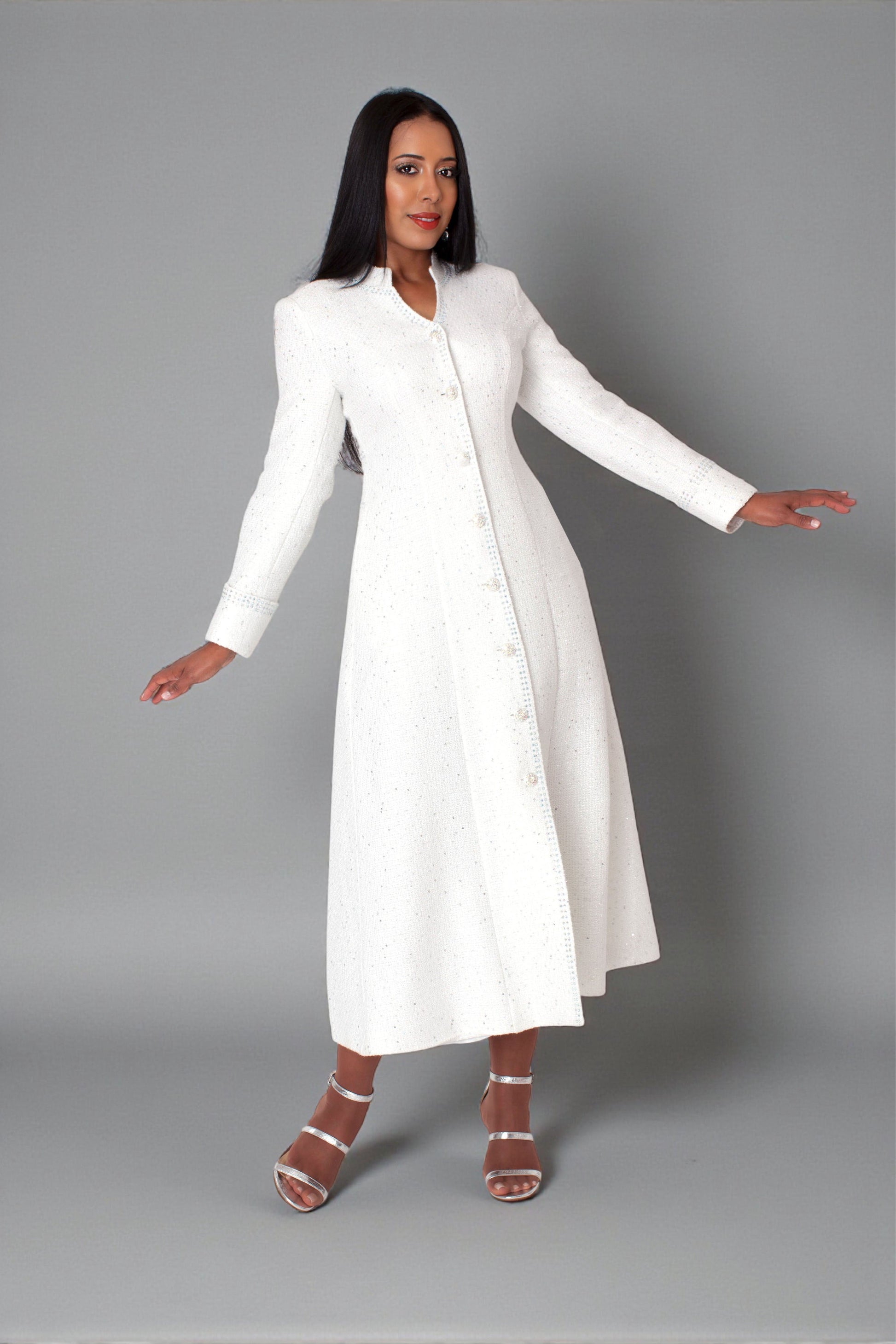 Model wearing the white elegant plus size tweed robe standing front facing, highlighting luxe tweed texture, crystal button detailing, and graceful modest design by Tally Taylor
