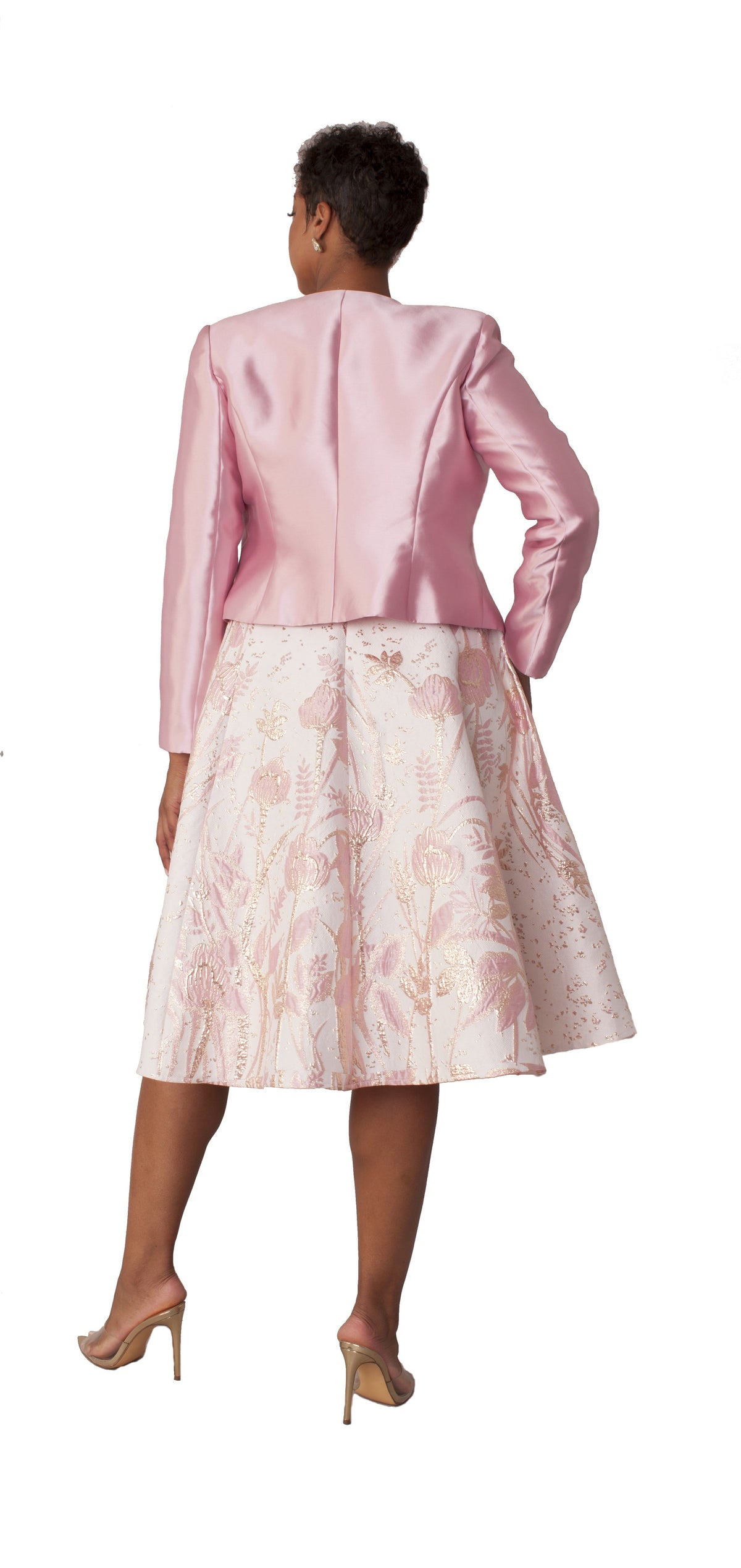 Elegant two-piece pink multi brocade dress and jacket set shown from the back, highlighting fit and flared A-line skirt by Tally Taylor