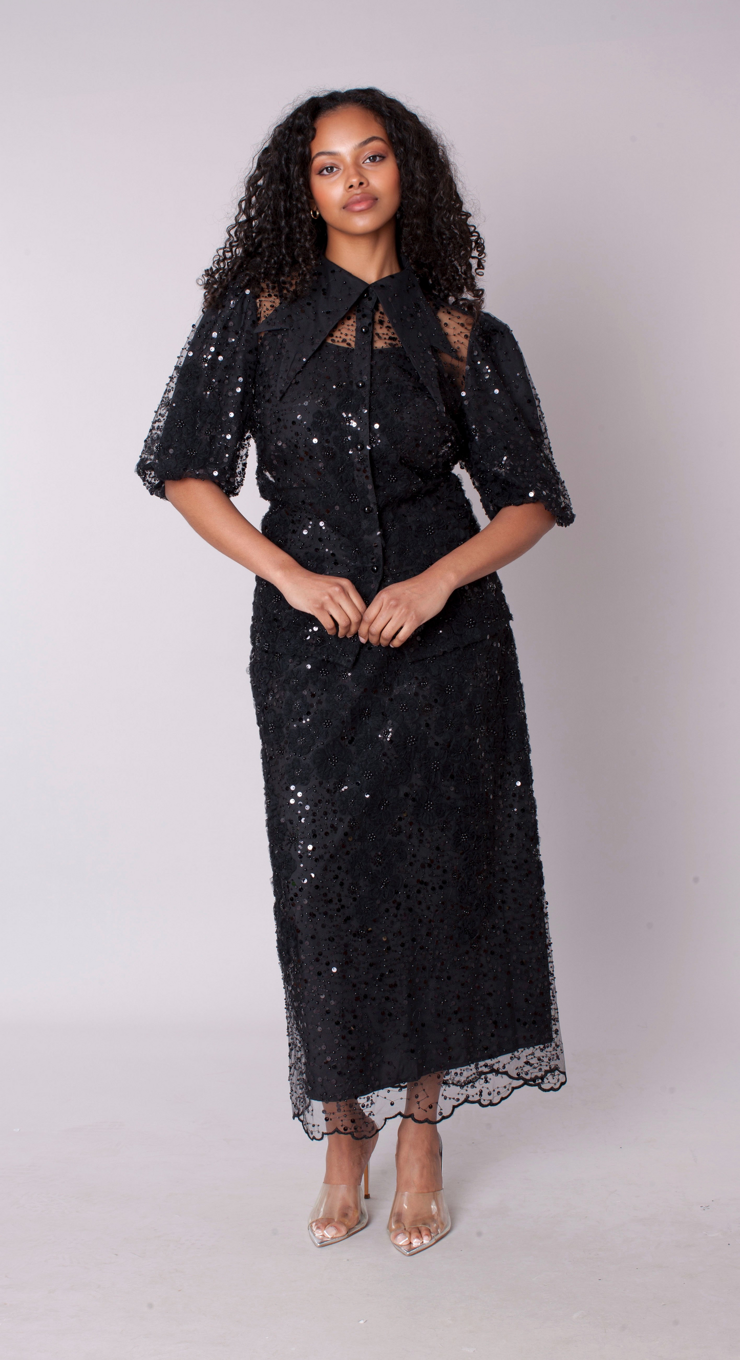 Black embroidered sequin organza skirt set with floral embroidery, model standing front in studio, For Her NYC