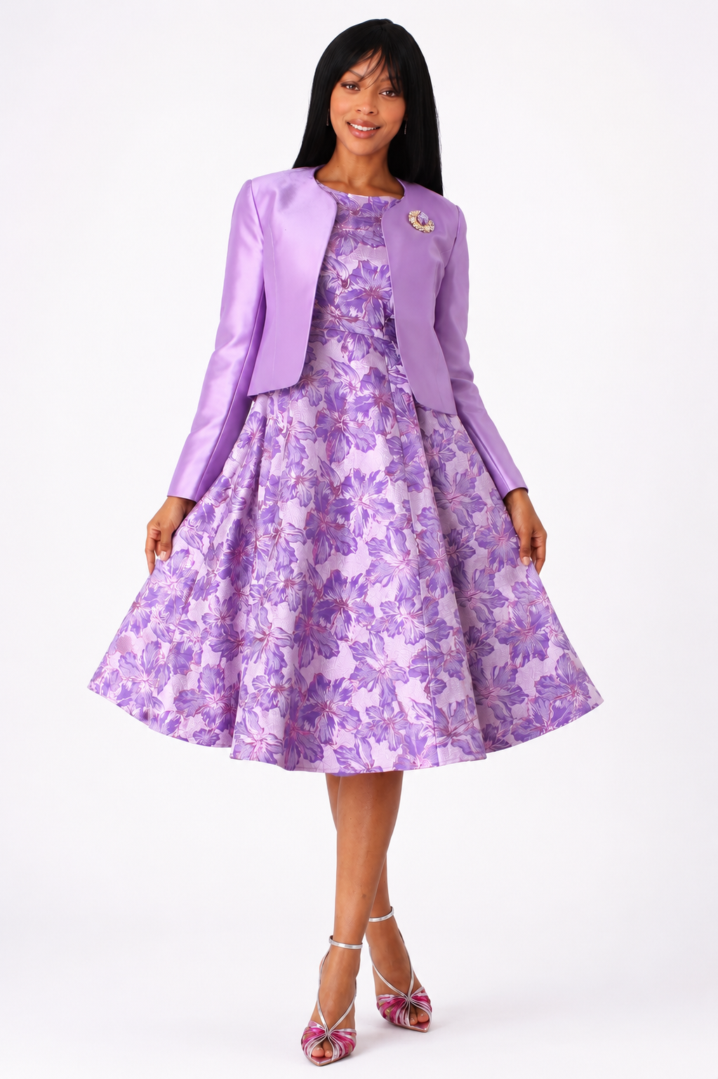 Woman wearing the Floral Brocade Church Dress with Jacket 4819 in purple featuring a floral brocade dress with a coordinating woven jacket by Tally Taylor.