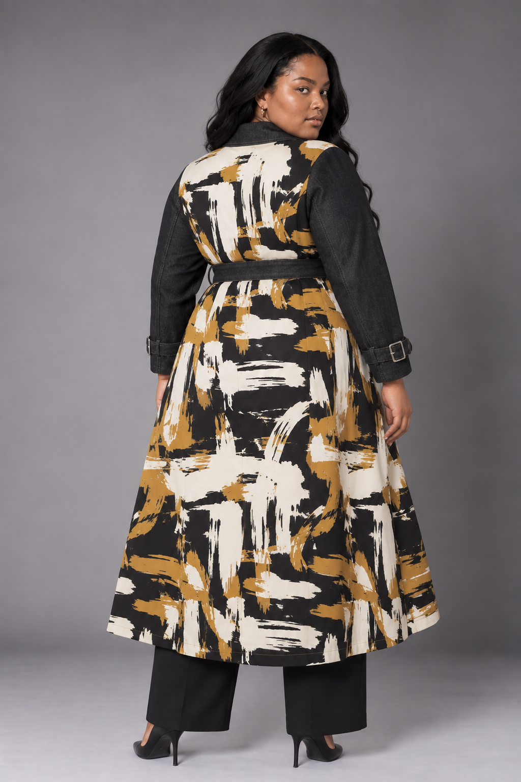 Back view of the For Her NYC Belted Plus Size High-Low Jacket T5229W, featuring a black, gold and white abstract print back and belted waist.