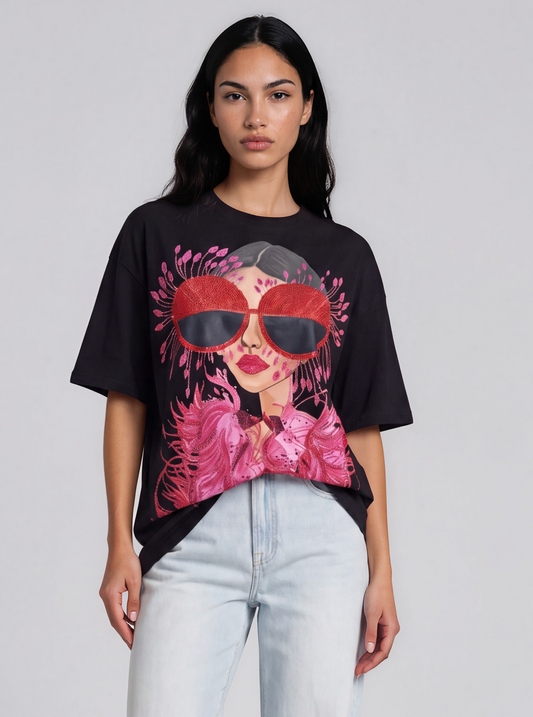 For Her NYC black oversized graphic T-shirt featuring a stylish glam girl illustration with rhinestone-inspired sunglasses and vibrant pink graphic artwork.