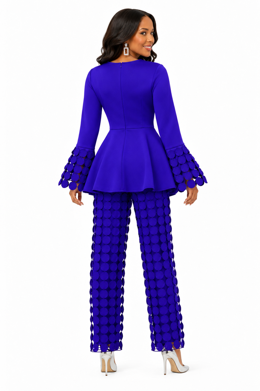 Back view of model wearing For Her NYC cobalt circle lace peplum top and pants set with statement bell sleeves, style U0561