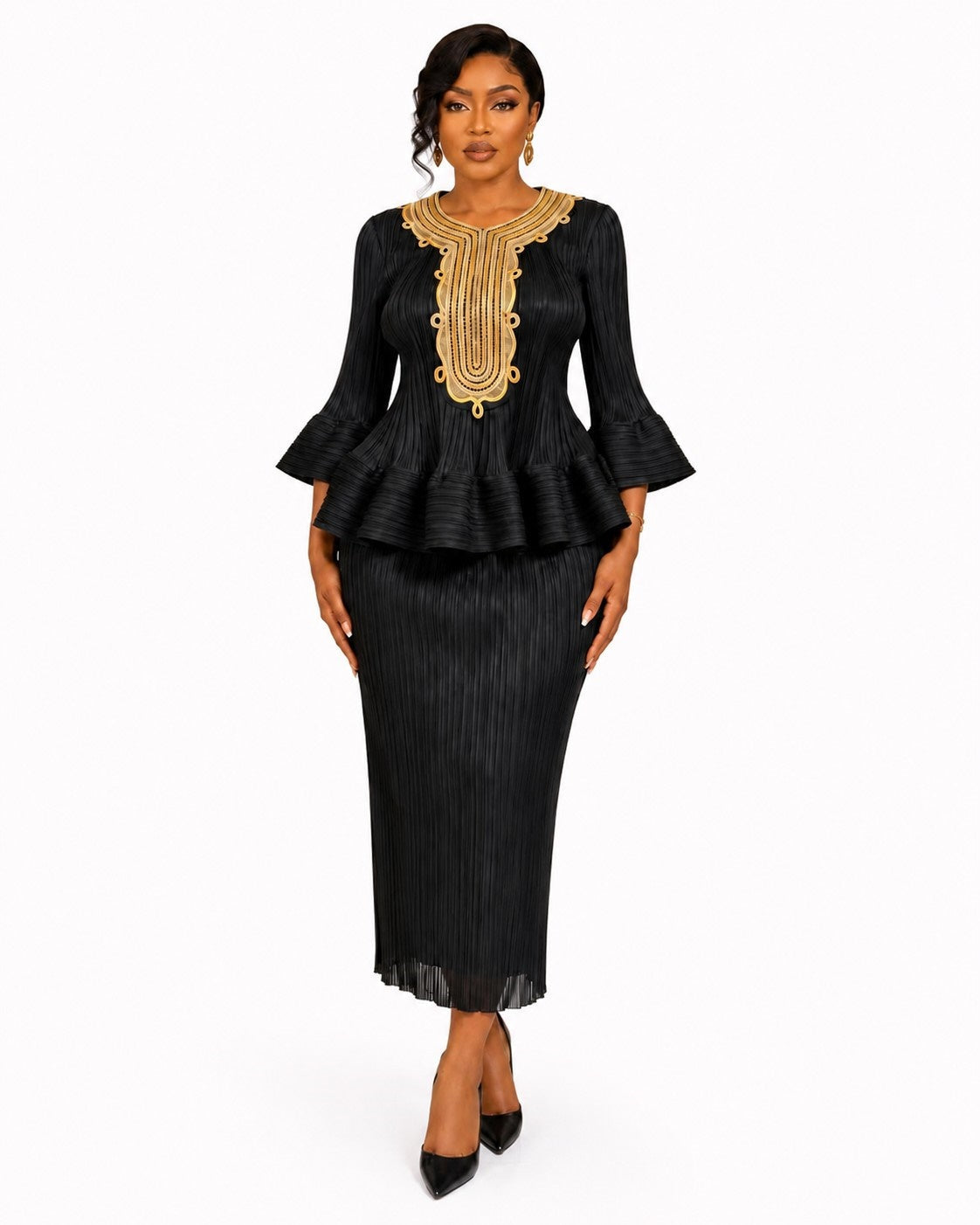 Front view of a model wearing the black For Her NYC Embellished Peplum Pleated Skirt Set - 83470 with gold neckline detailing, three-quarter flared sleeves, a ruffled peplum top, and pleated midi skirt