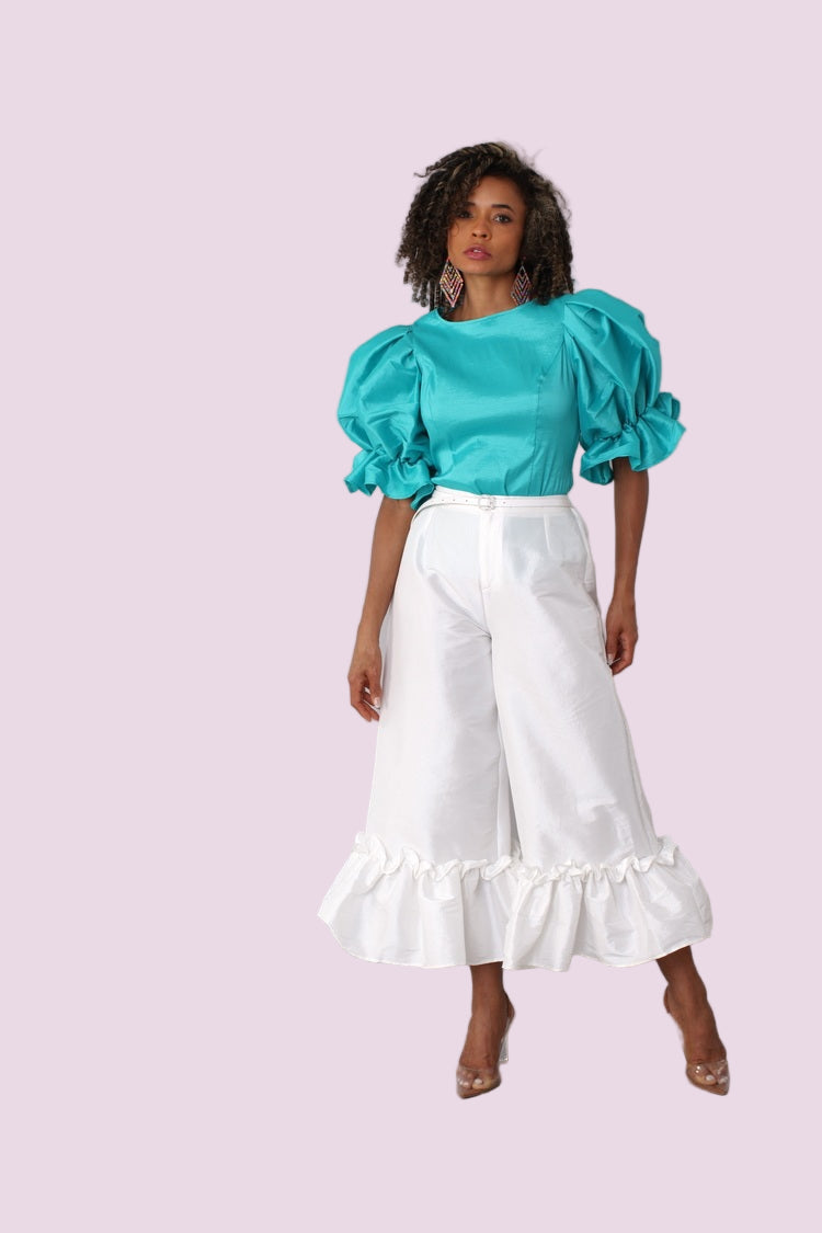Jade puff sleeve satin blouse slight front angle showing sleeve volume and shine — For Her NYC
