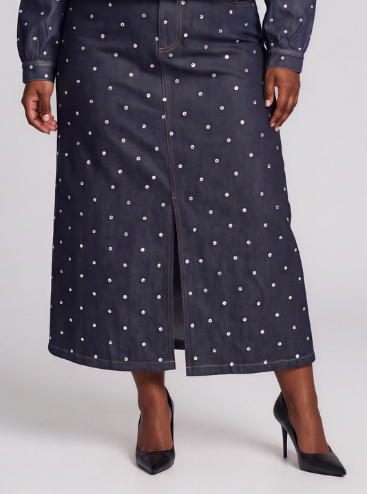 Front detail of a plus size model wearing the dark-wash For Her NYC Embellished Denim Maxi Skirt - 82963 with allover gem embellishments and a front slit