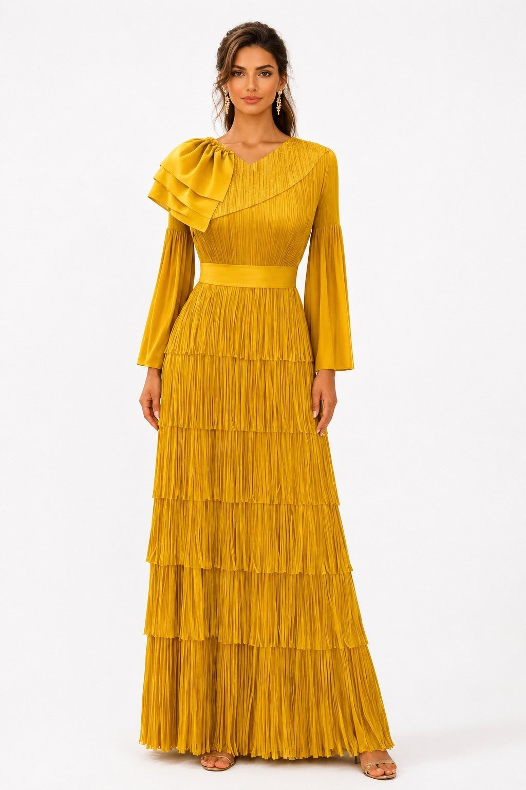 Front view of a model wearing the yellow For Her NYC Tiered Pleated Maxi Dress with Ruffle Shoulder - 83466, featuring long bell sleeves, an embellished neckline, and layered pleated tiers