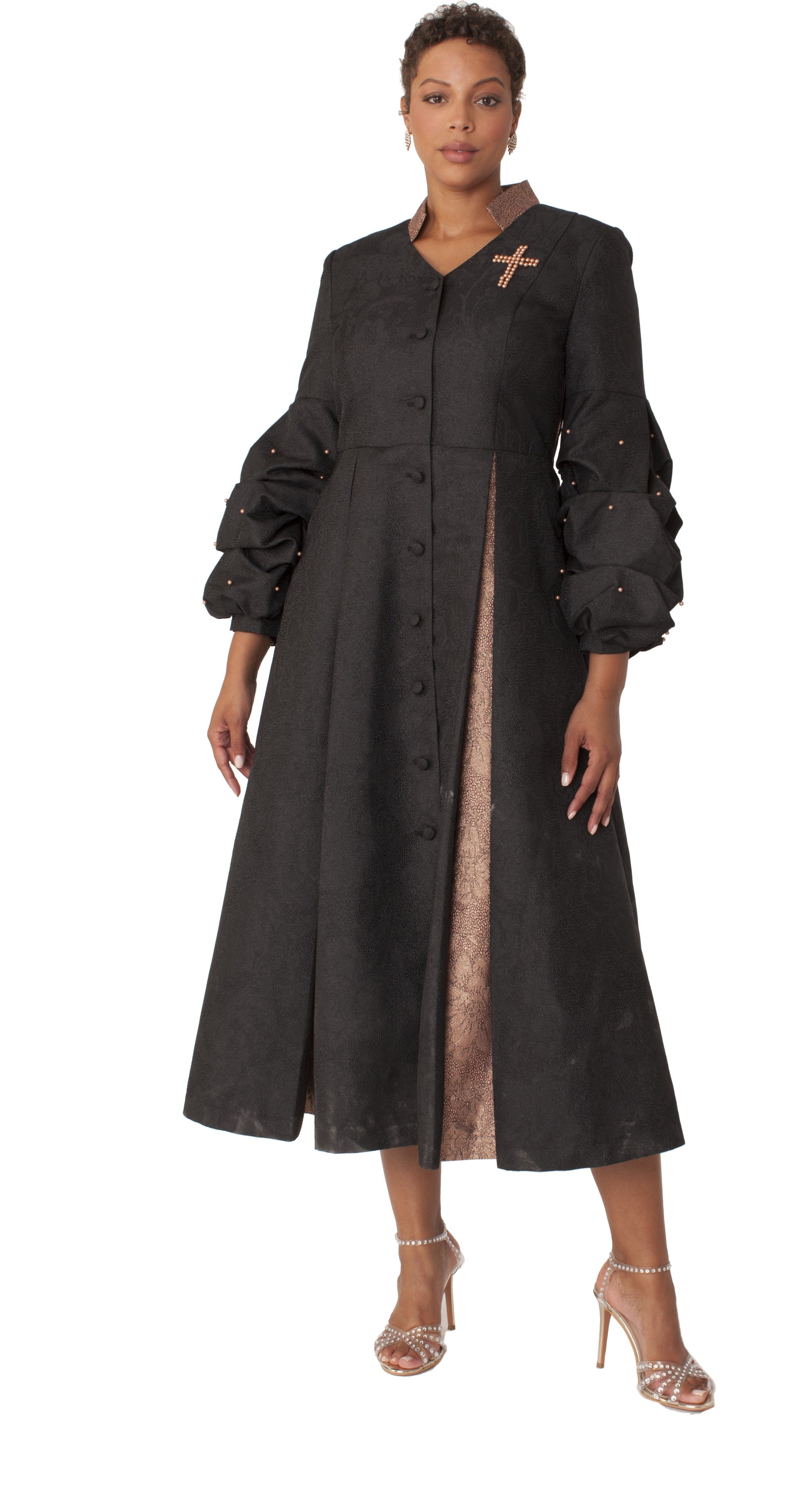 Black formal dress robe with dramatic puff sleeves and pearl cross accent, front view showcasing elegant silhouette and gold-tone details by Tally Taylor