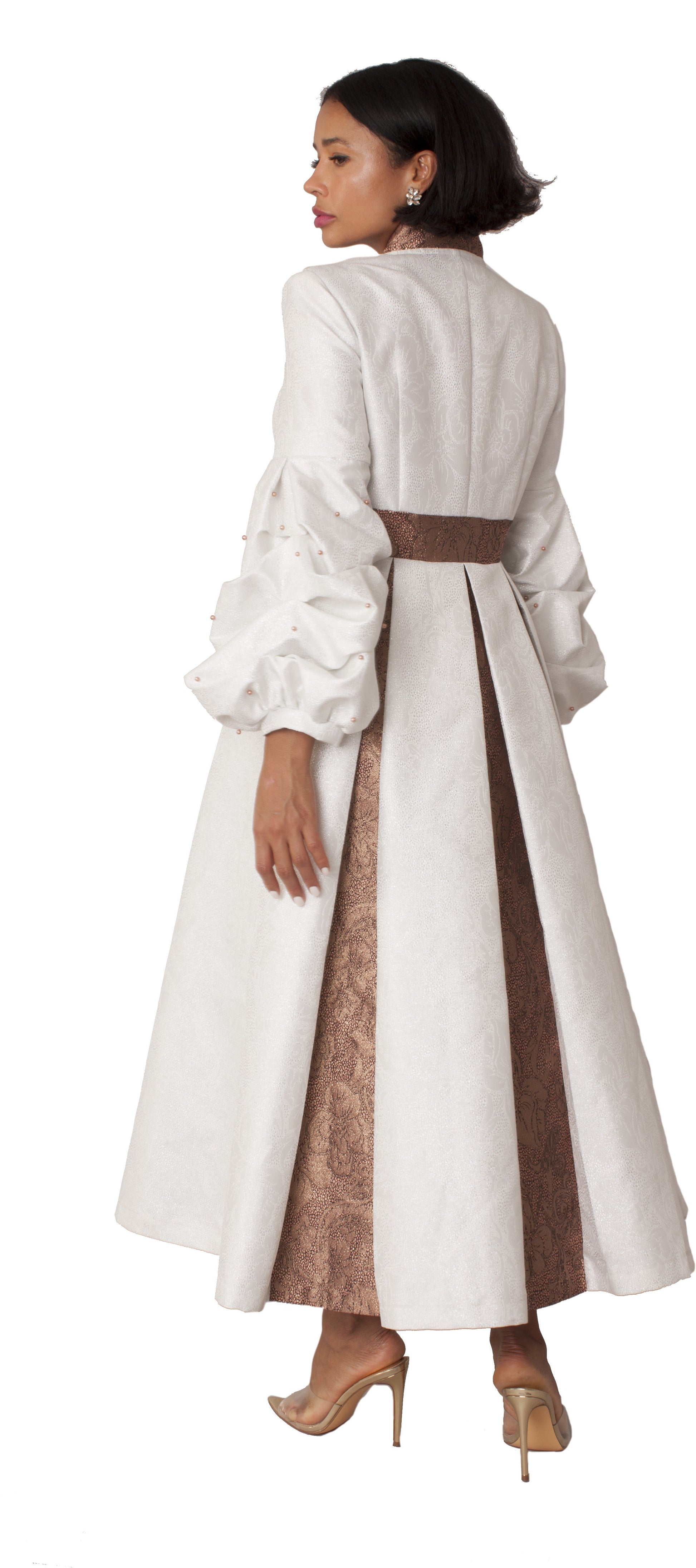 White formal dress robe with puff sleeves and pearl cross accent, back view showcasing elegant drape and ceremonial styling by Tally Taylor