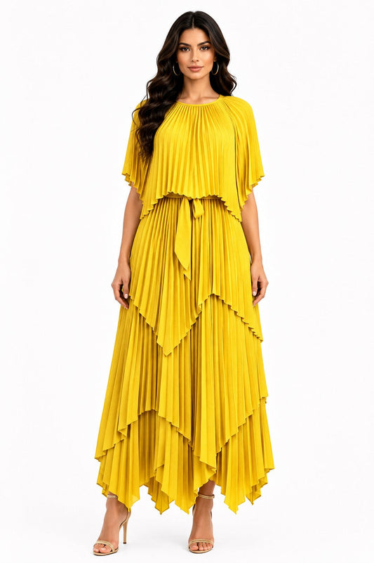 Model wearing the Layered Pleated Maxi Dress with Cape in Yellow featuring flowing tiered pleats, a draped cape overlay, flutter sleeves, and an elegant maxi silhouette by ForHerNYC