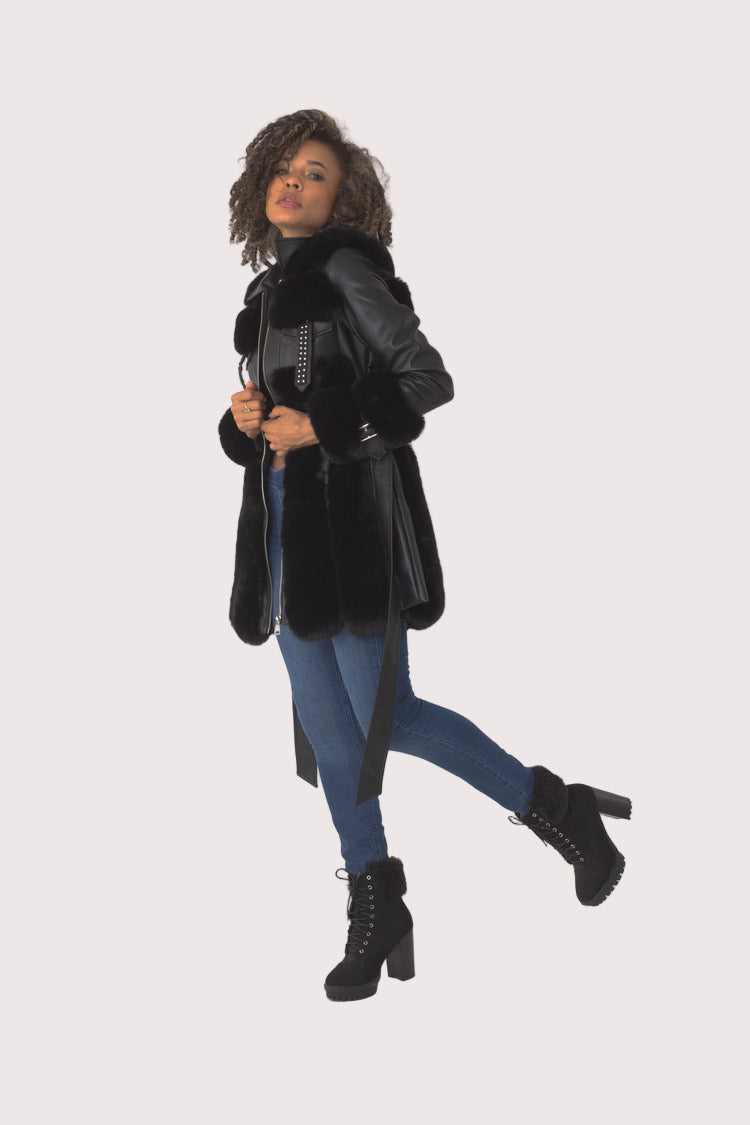 Black faux leather jacket with fur trim, side pose