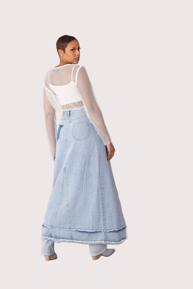 Back view of light wash long denim skirt showing clean back fit and full-length silhouette, For Her NYC