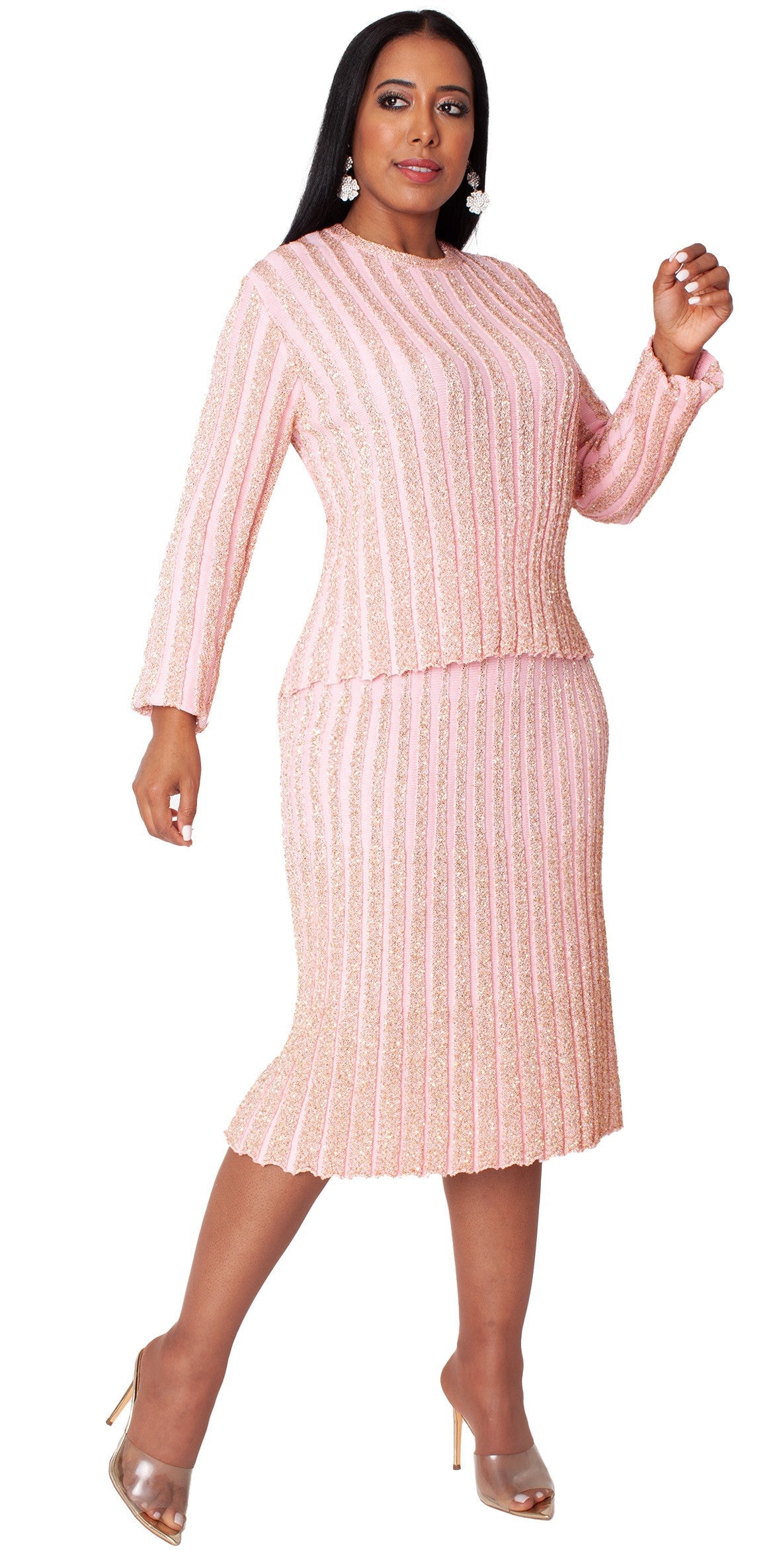 Model wearing pink and gold shimmer knit suit, front standing pose by Tally Taylor