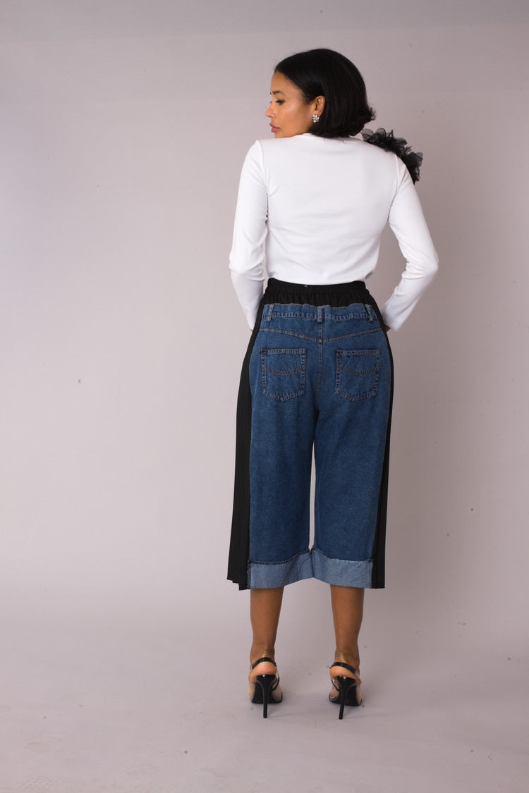 Back view of Pleated Panel Denim Culottes showing rear fit, waistband, and clean pleated construction, For Her NYC