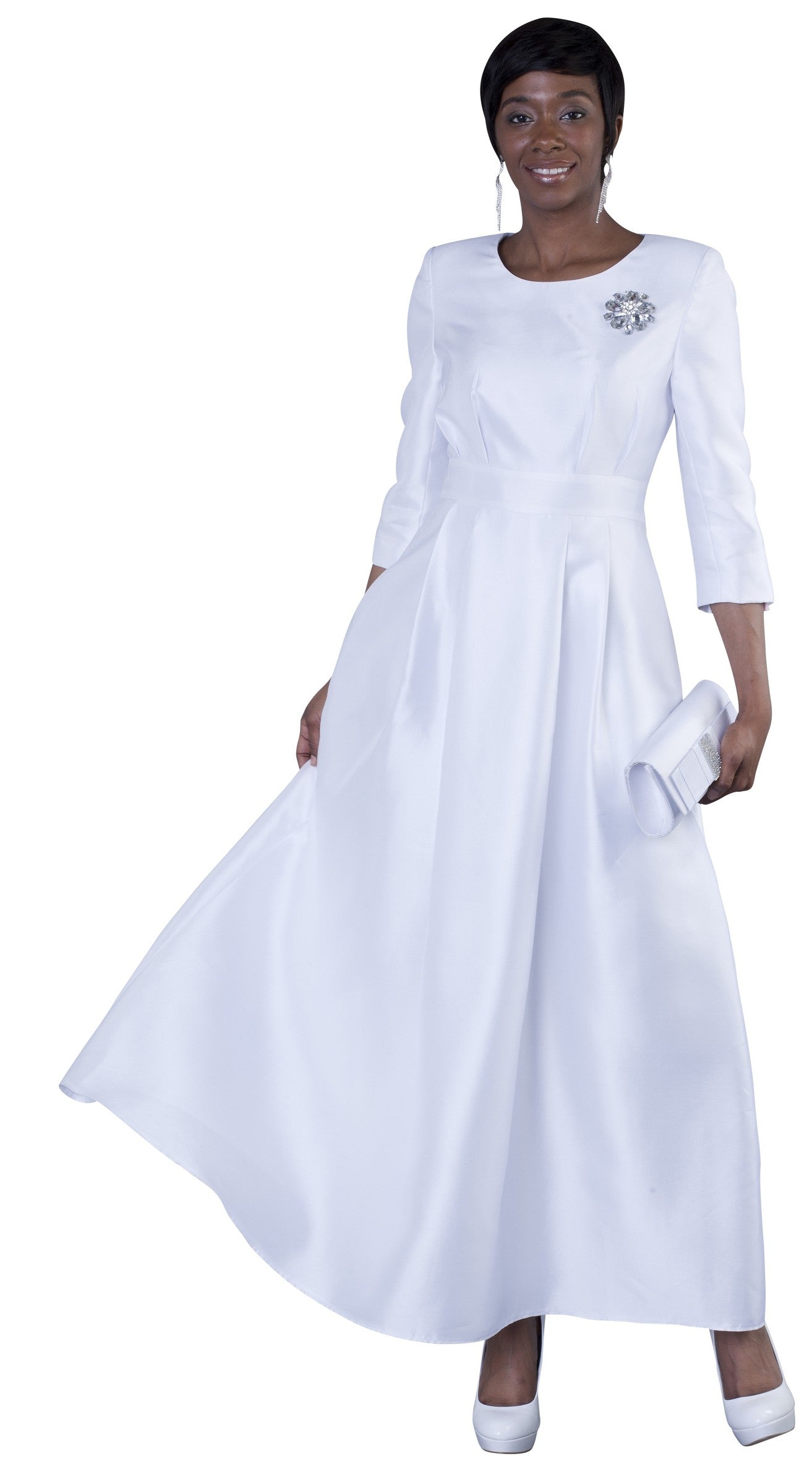 Model wearing white plus size satin dress with rhinestone brooch, front standing pose by Tally Taylor