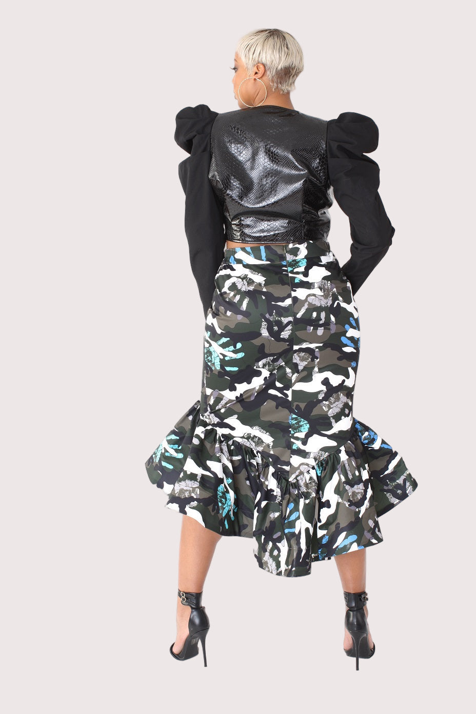 Grey olive camo high low skirt back view showing asymmetrical hem and flowing movement.