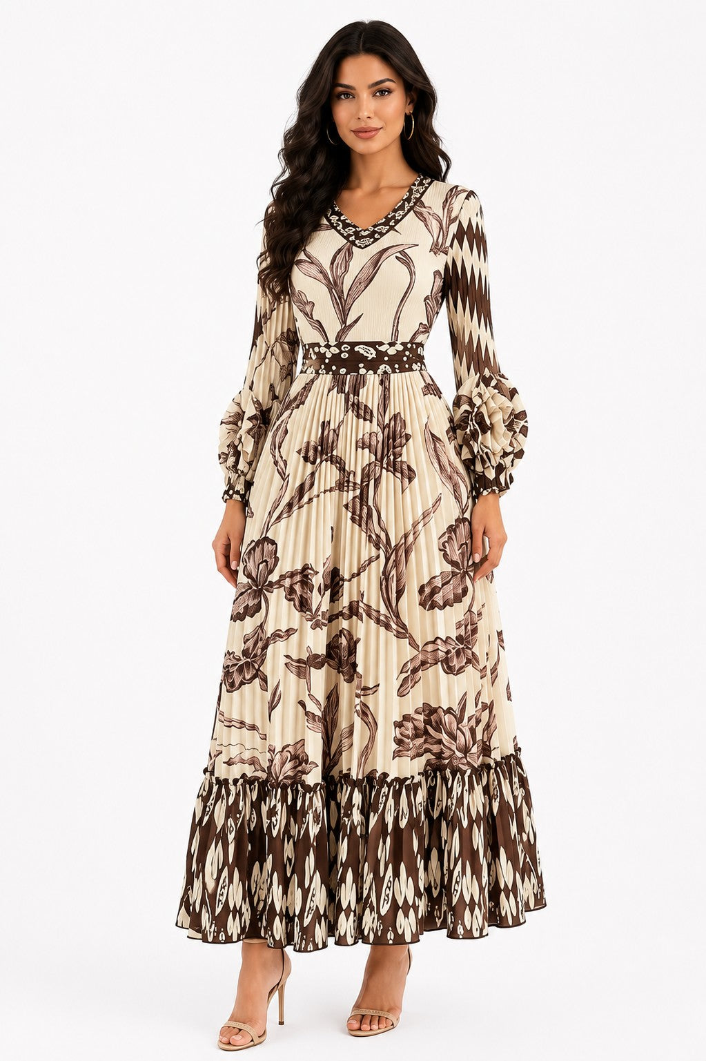 Model wearing the Printed Tiered Pleated Maxi Dress in Brown with an artistic abstract print, tiered pleats, long sleeves, and a flattering maxi-length silhouette by For Her NYC