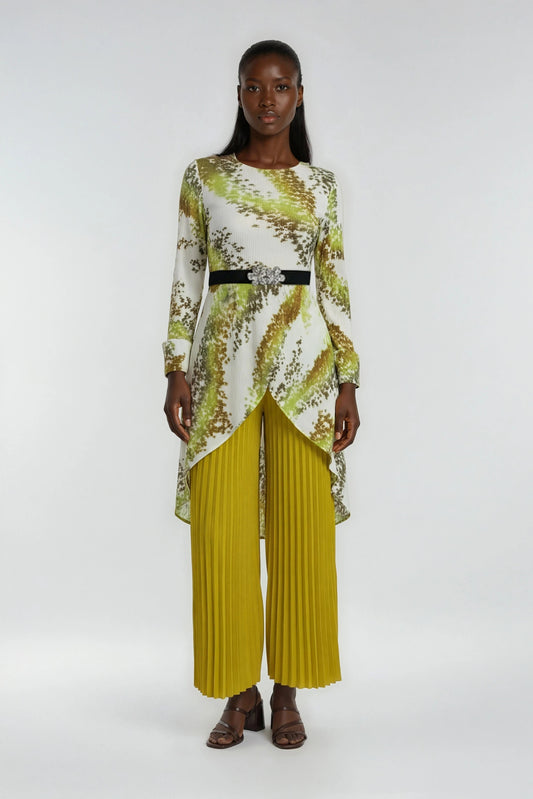 Front view of model wearing yellow multi printed tunic top with pleated wide-leg pants, For Her NYC