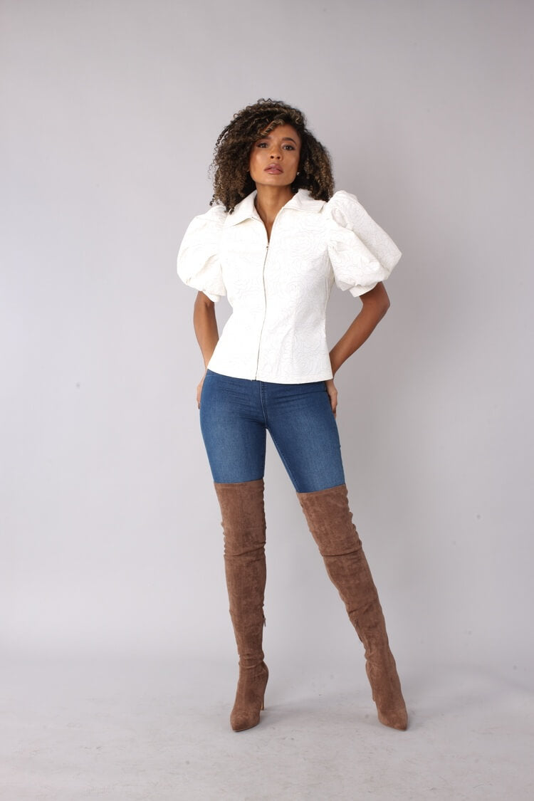 Off White puff sleeve faux leather jacket shown front view with relaxed stance and fitted silhouette by For Her NYC